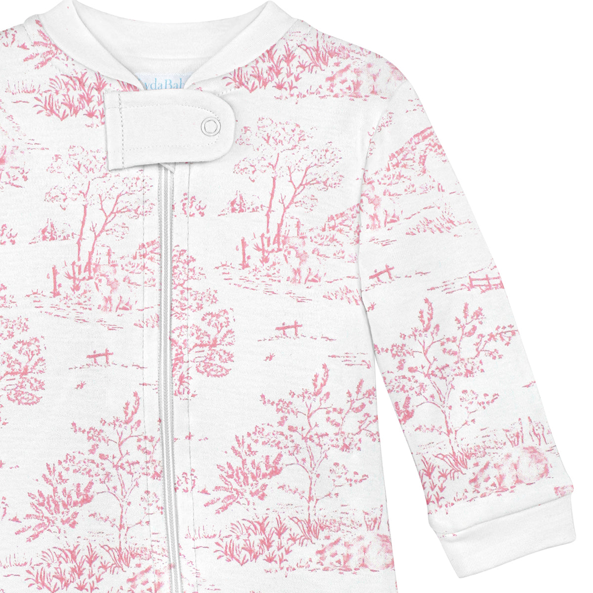 Zipper footie for baby girl with Toile de Jouy print, made from ultra-soft Peruvian Pima cotton — elegant, breathable, and gentle on delicate skin.