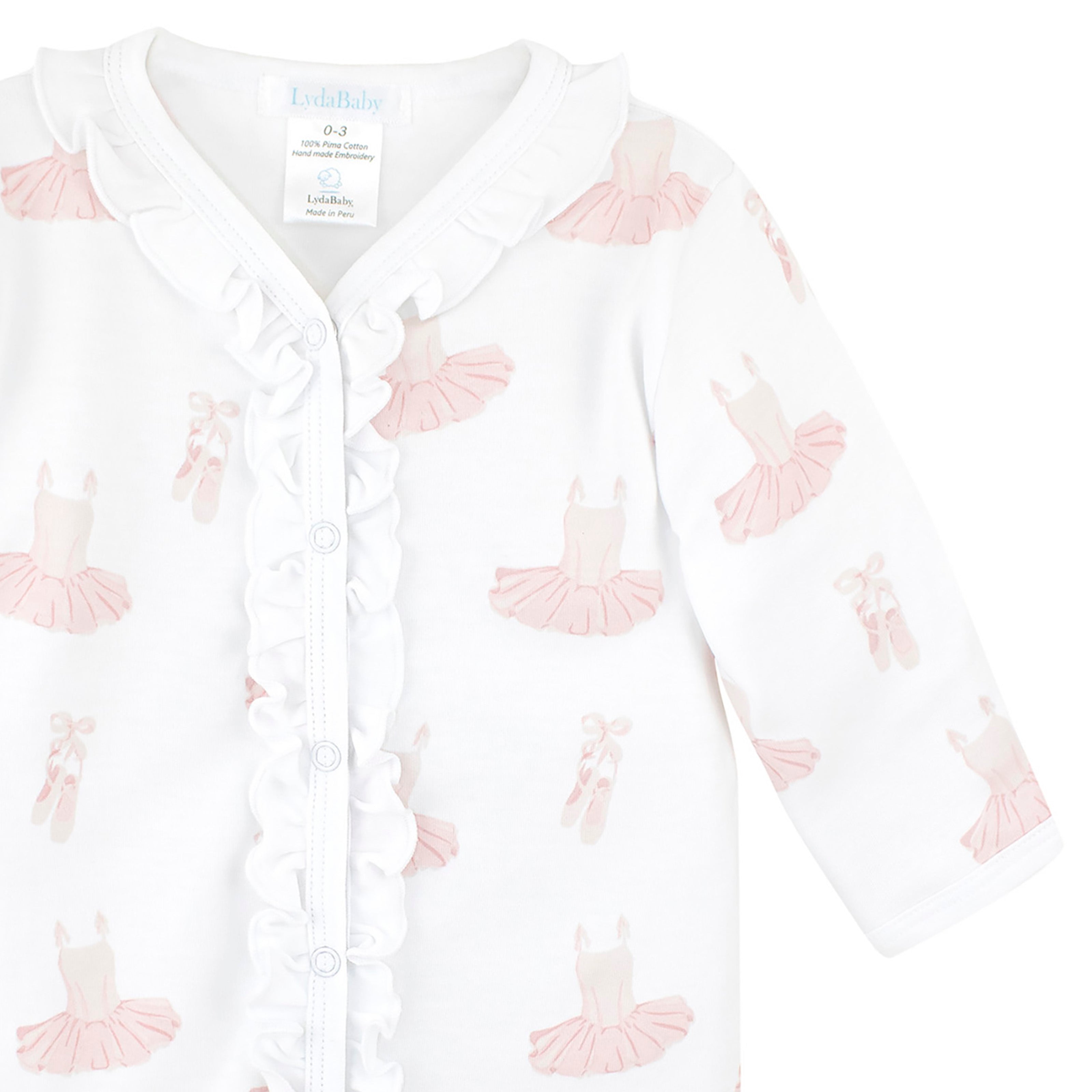 Baby girl footie with ballerina dress print and delicate ruffle details along the chest and snap closure, made from ultra-soft Peruvian Pima cotton.