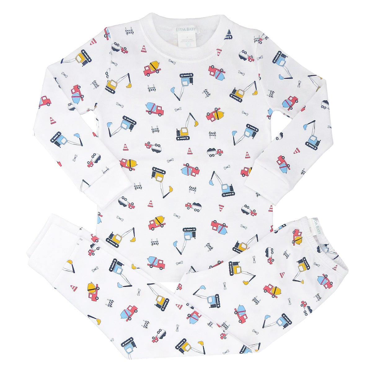 Soft baby boy pajama set in Peruvian Pima cotton with 'Kids construction' print — breathable and hypoallergenic luxury sleepwear from boutique baby clothing collections.