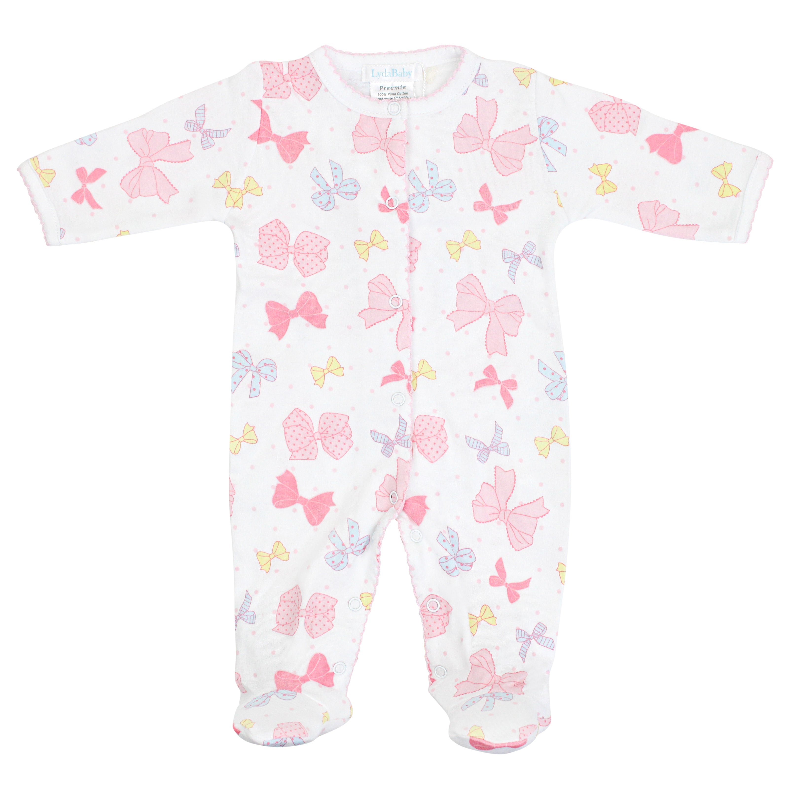Soft Peruvian Pima cotton baby footie for girls featuring charming All Bows print – breathable, hypoallergenic, and perfect for sensitive newborn skin