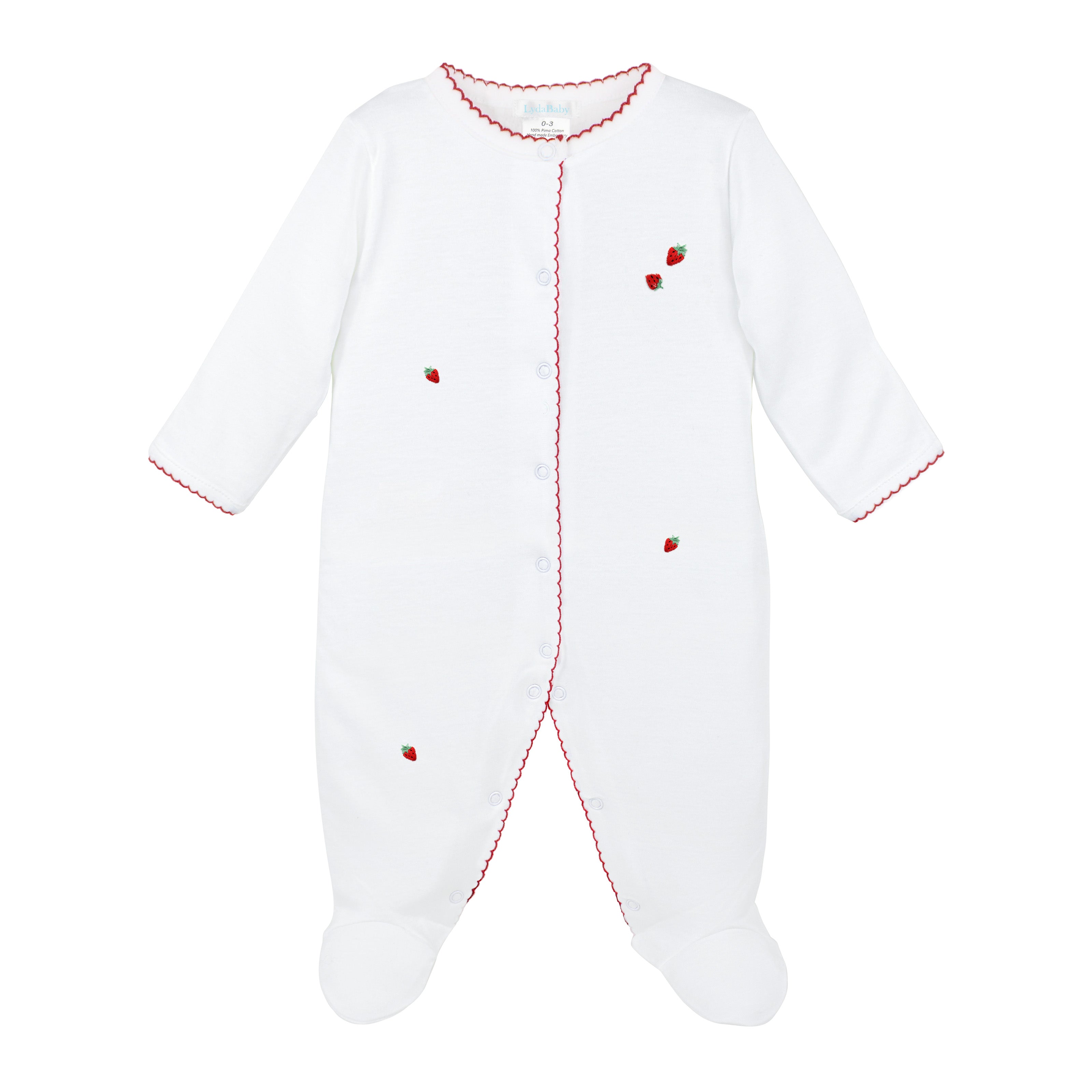 Luxury baby girl footie made from premium Peruvian Pima cotton, featuring delicate hand-embroidered cherries and red scalloped trims. A soft, hypoallergenic and breathable baby outfit, perfect for sensitive skin.