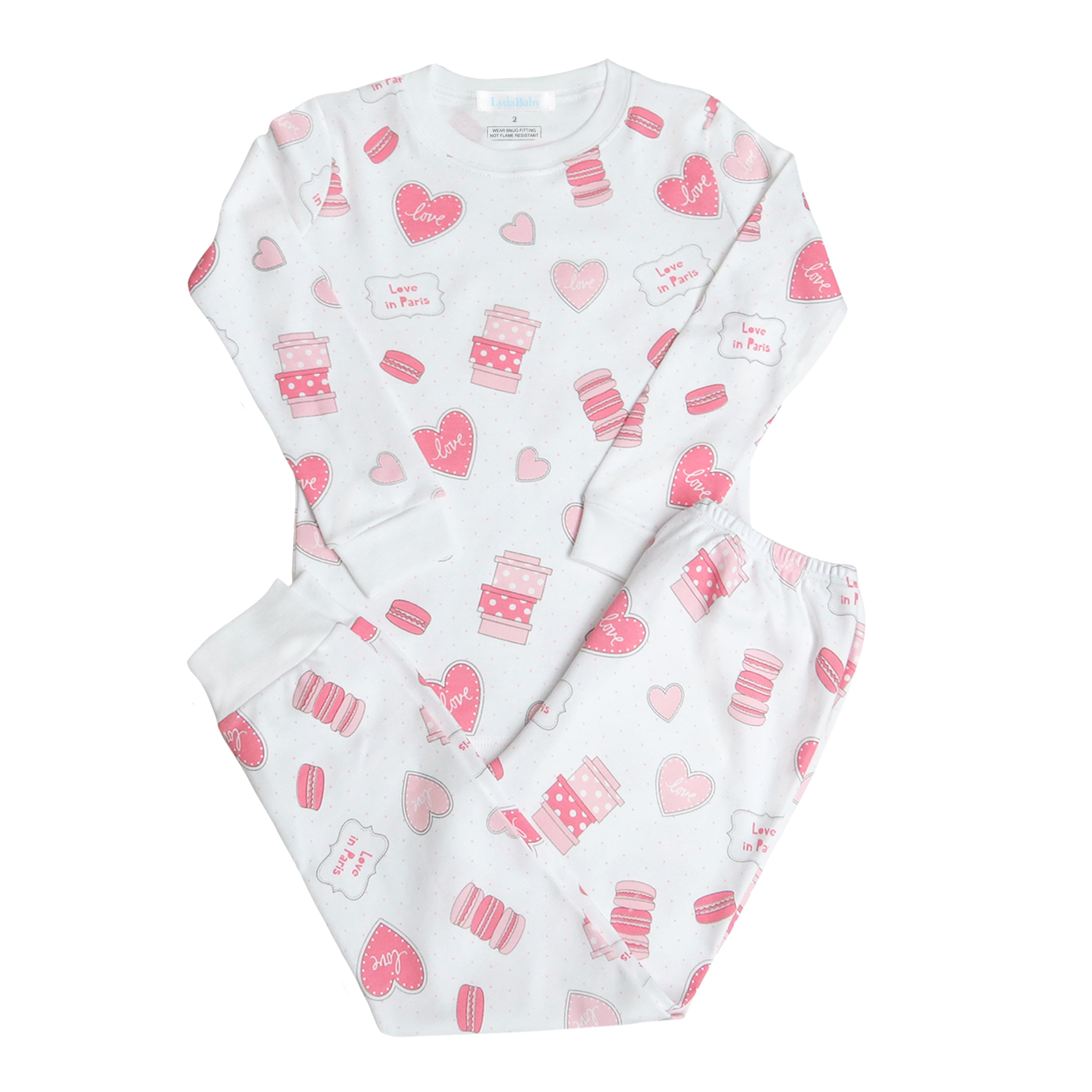 Soft baby girl pajama set in Peruvian Pima cotton with 'Love in Paris' print — breathable and hypoallergenic luxury sleepwear from boutique baby clothing collections.