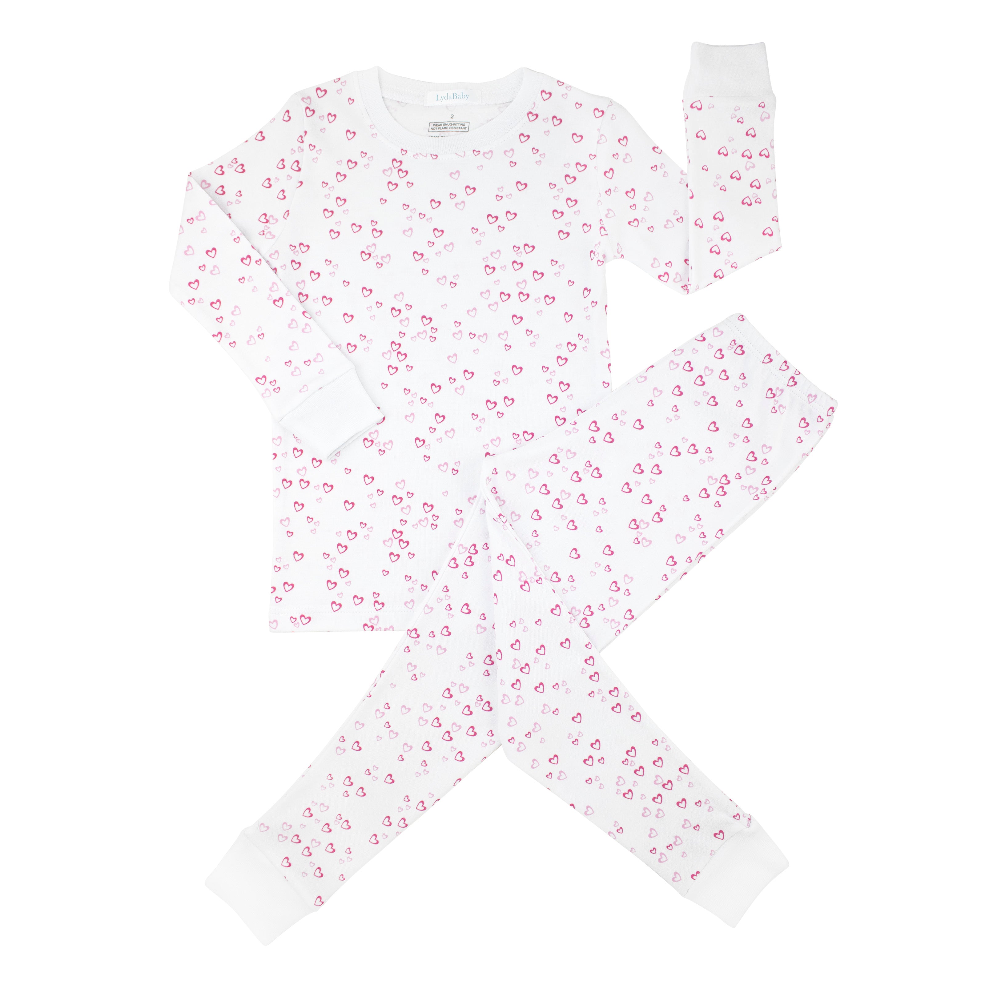 Soft baby girl pajama set in Peruvian Pima cotton with 'Little love' print — breathable and hypoallergenic luxury sleepwear from boutique baby clothing collections.