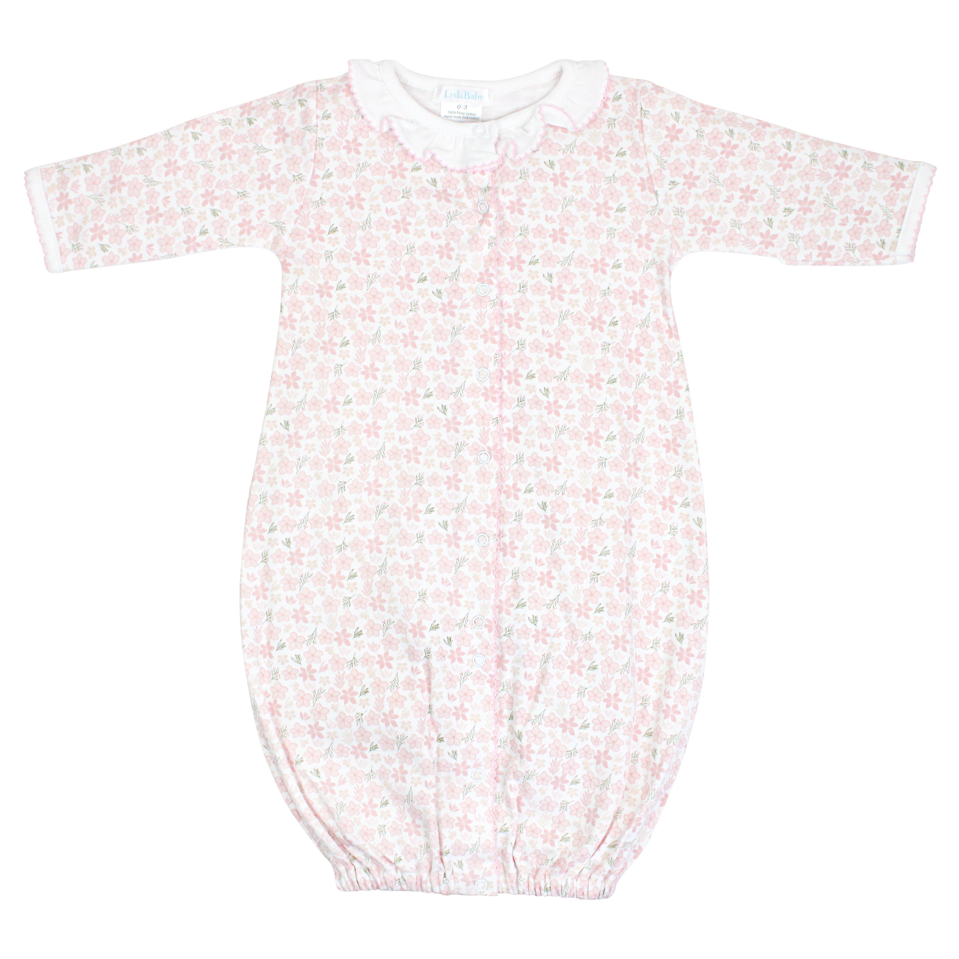 Delicate baby girl converter with winter blooming flowers printed on soft, breathable Peruvian Pima cotton — cozy and skin-friendly.