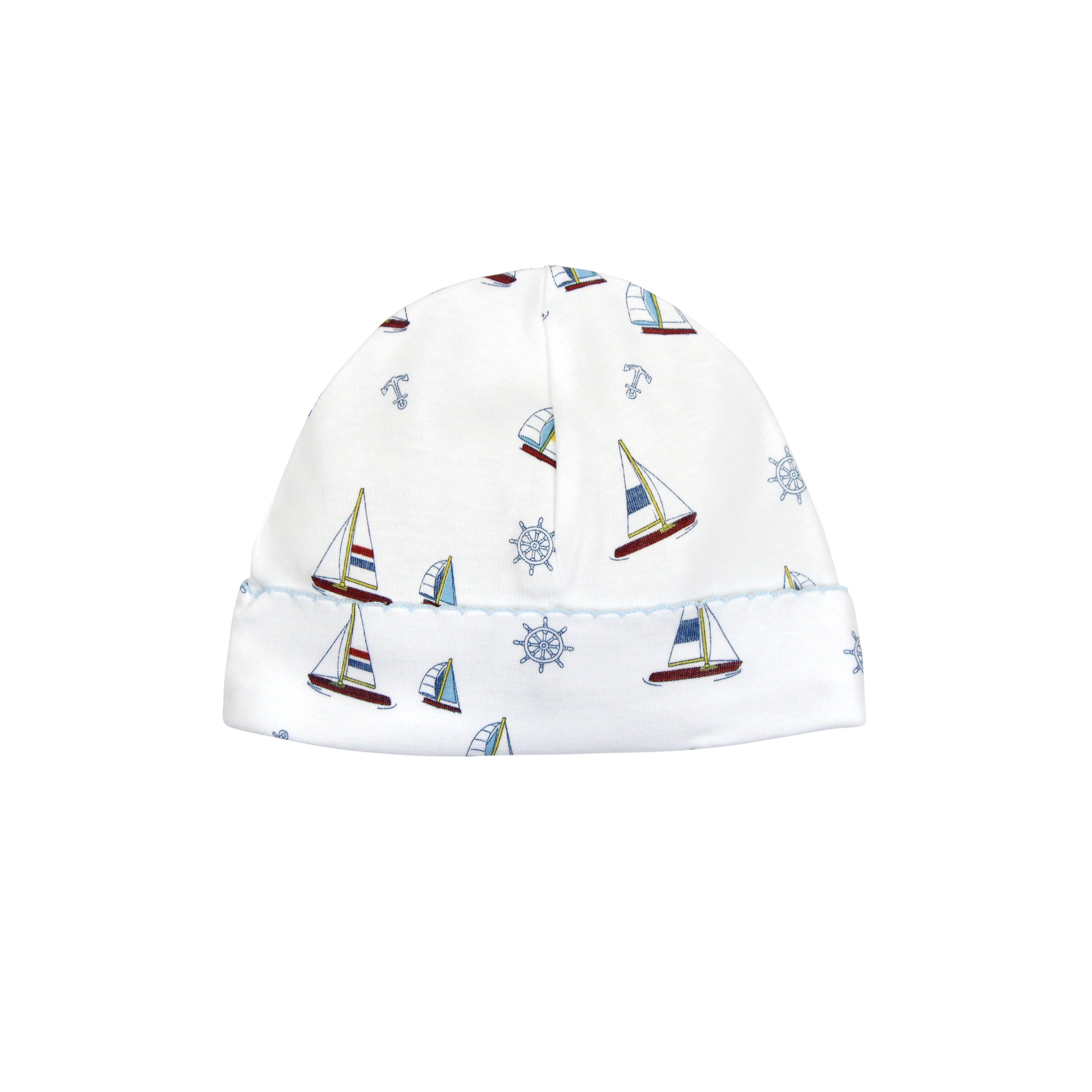 Cute baby boy hat featuring sailing boats print on soft Peruvian Pima cotton — designed for sensitive skin and sunny adventures.