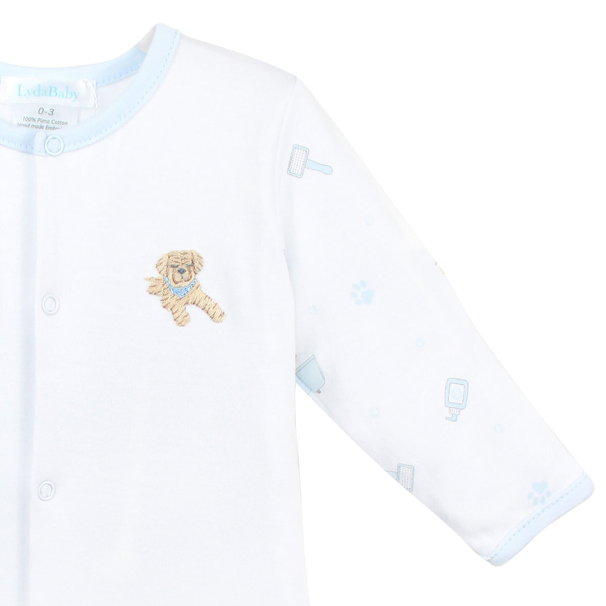 Cozy baby boy footie in Peruvian Pima cotton, with a playful pet spa print on sleeves and feet, and hand-embroidered puppy in a blue bathtub on the chest — ultra-soft, breathable, and full of personality.