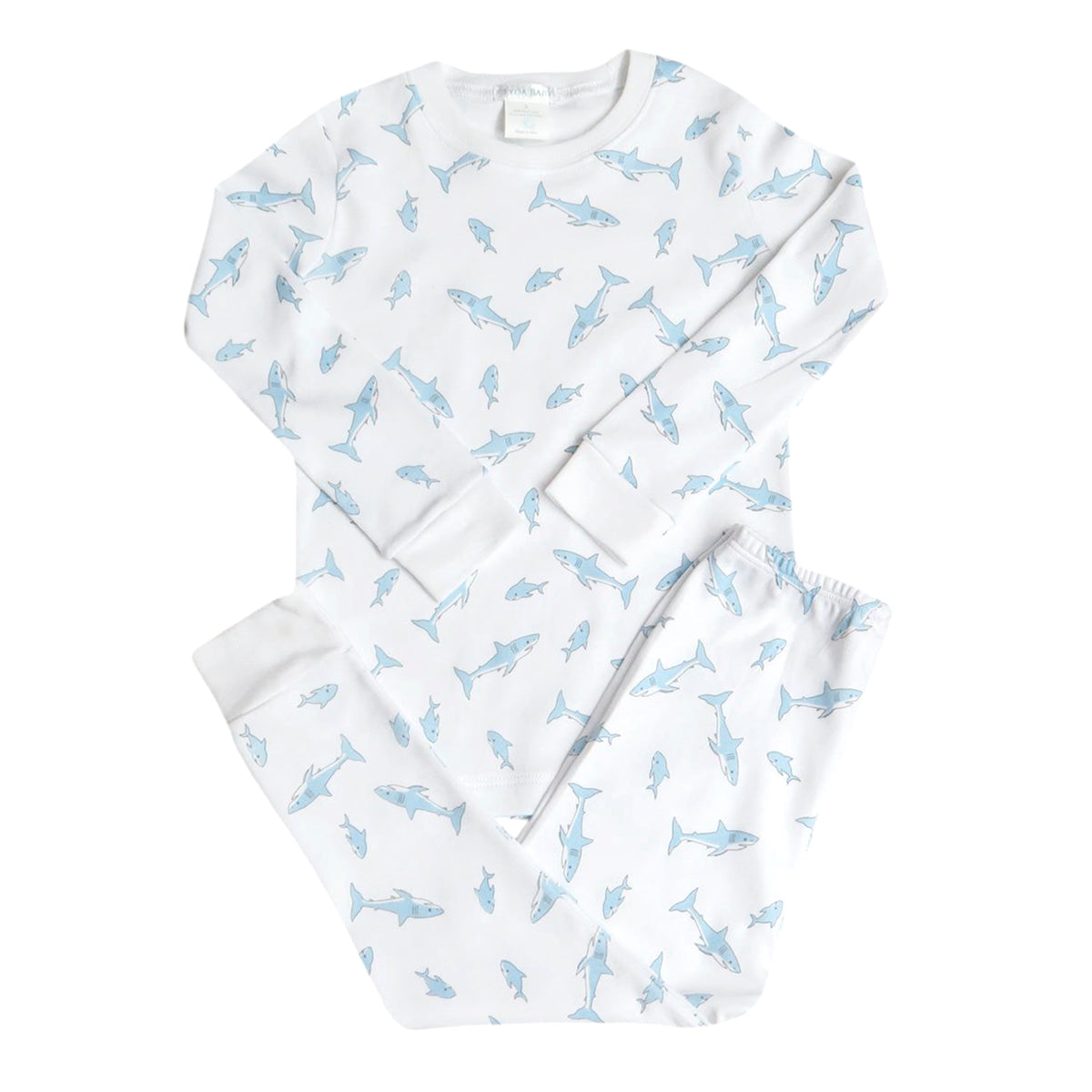 a white and blue pajamas with a shark print on it