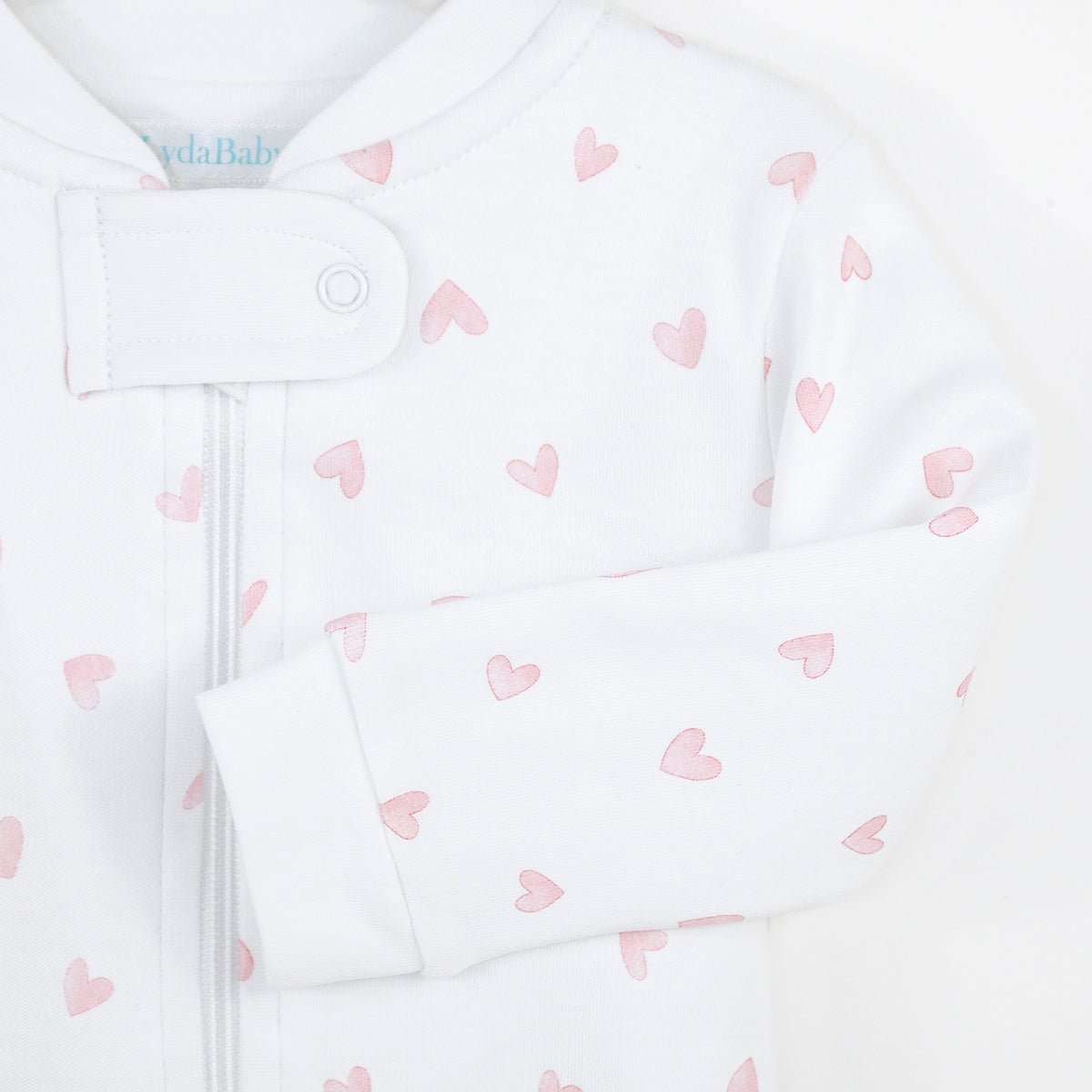 Festive Hearts Printed Zipper Footie | Baby Girl