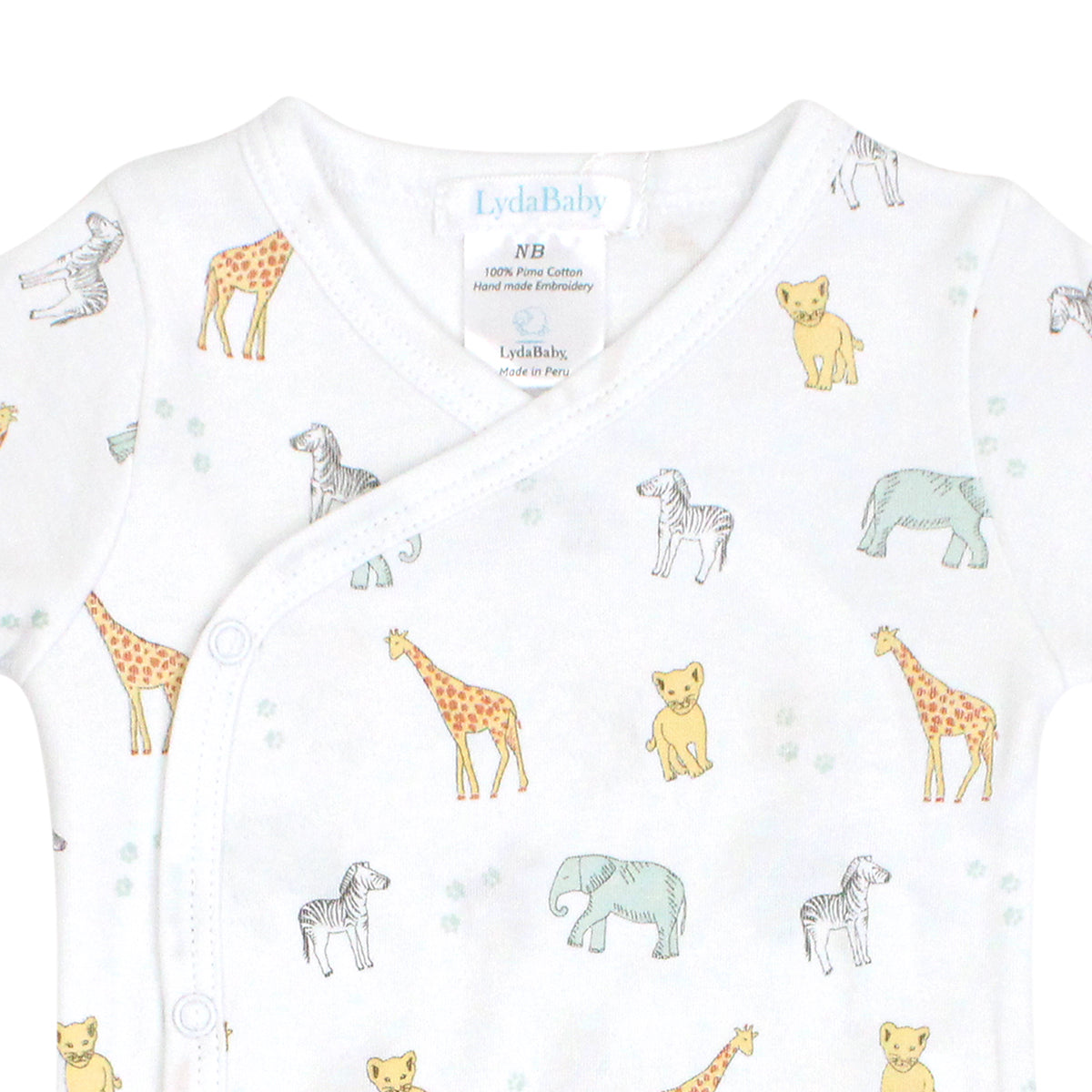 Luxury Peruvian Pima cotton baby boy pajamas with safari animals print, featuring a long-sleeve snap top and matching pants — breathable, soft, and playful.