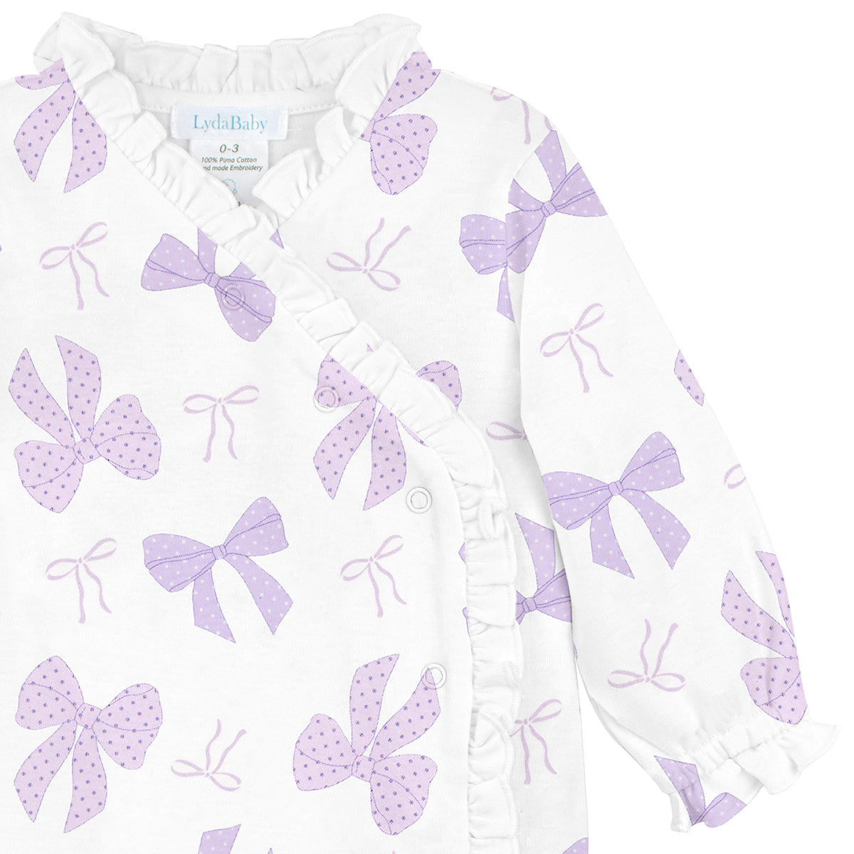 White baby footie made of Peruvian Pima cotton, with cross snap closure and lilac ribbon print in thin and bold lines.