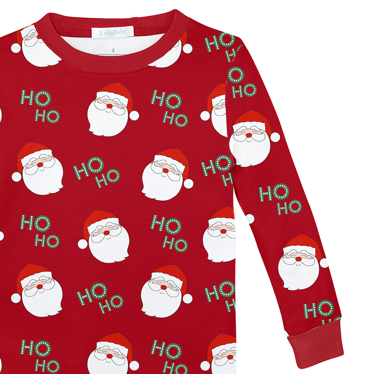 Unisex red baby pajama set with Santa faces and Ho Ho print from Santa Collection