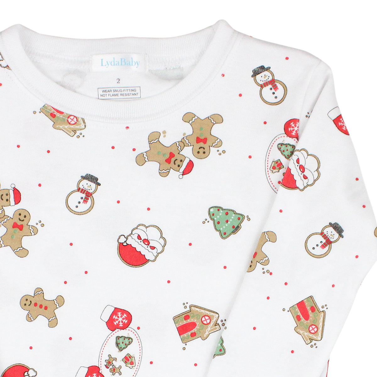 Unisex two-piece Christmas pajamas for baby in Peruvian Pima cotton with gingerbread, Santa, and holiday treats print, long-sleeve top and pants.