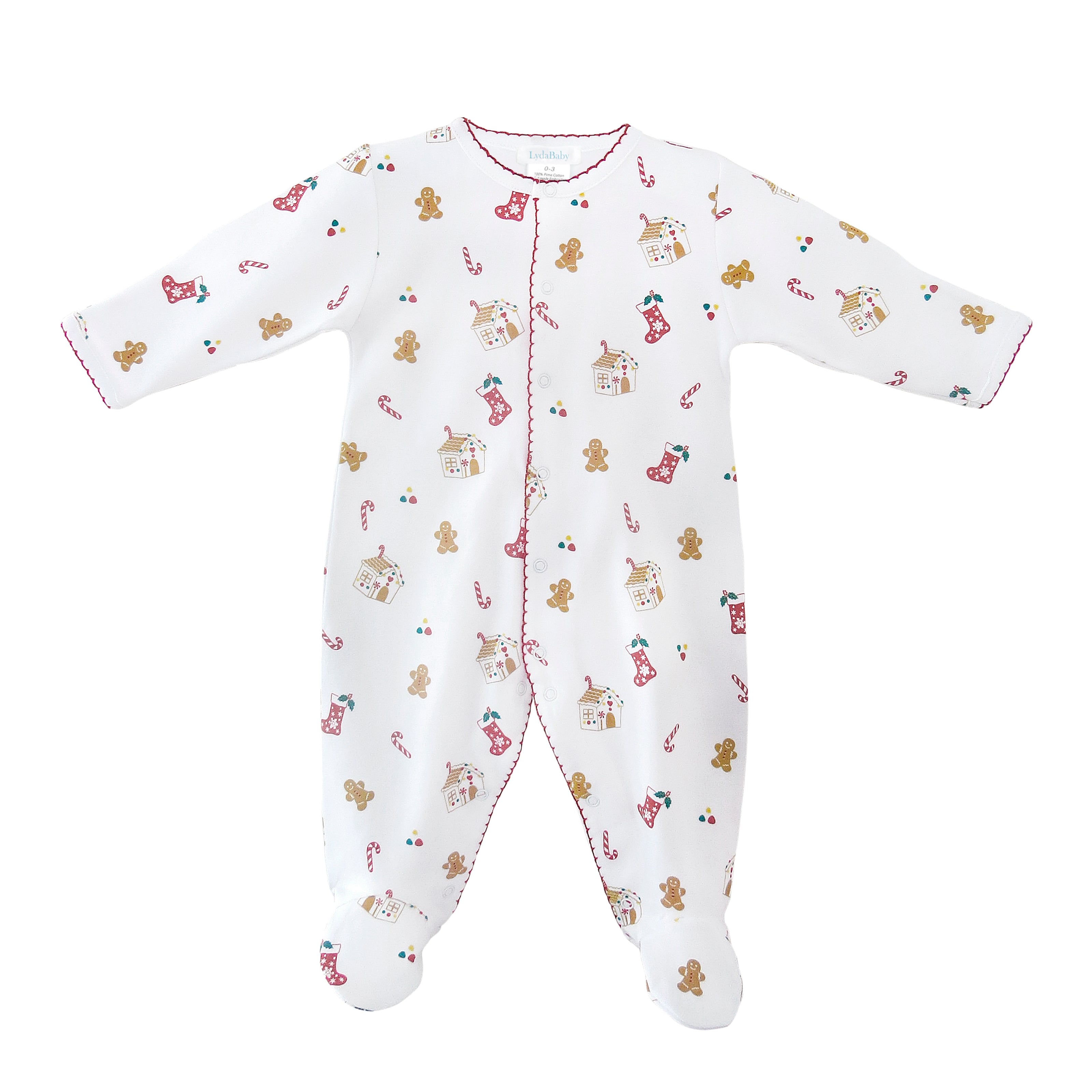 White baby footie in Peruvian Pima cotton with gingerbread houses, cookies, stockings, candy canes print and red crochet trim on collar, cuffs, and snap edges.