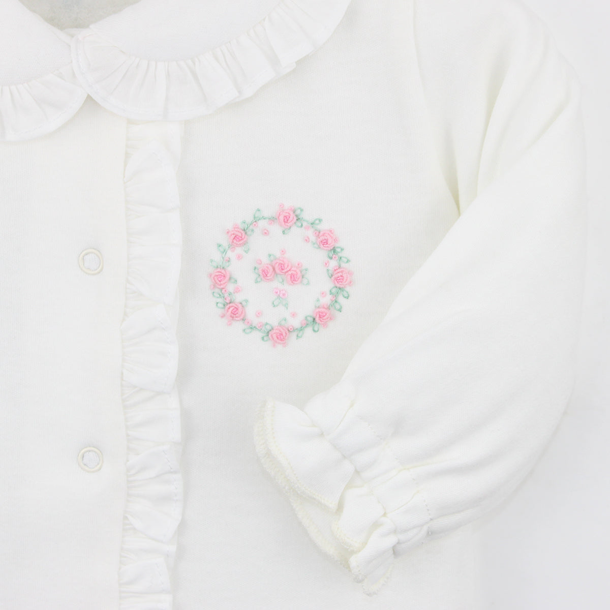 Luxury Peruvian Pima cotton footie with ruffled trim and delicate rose embroidery