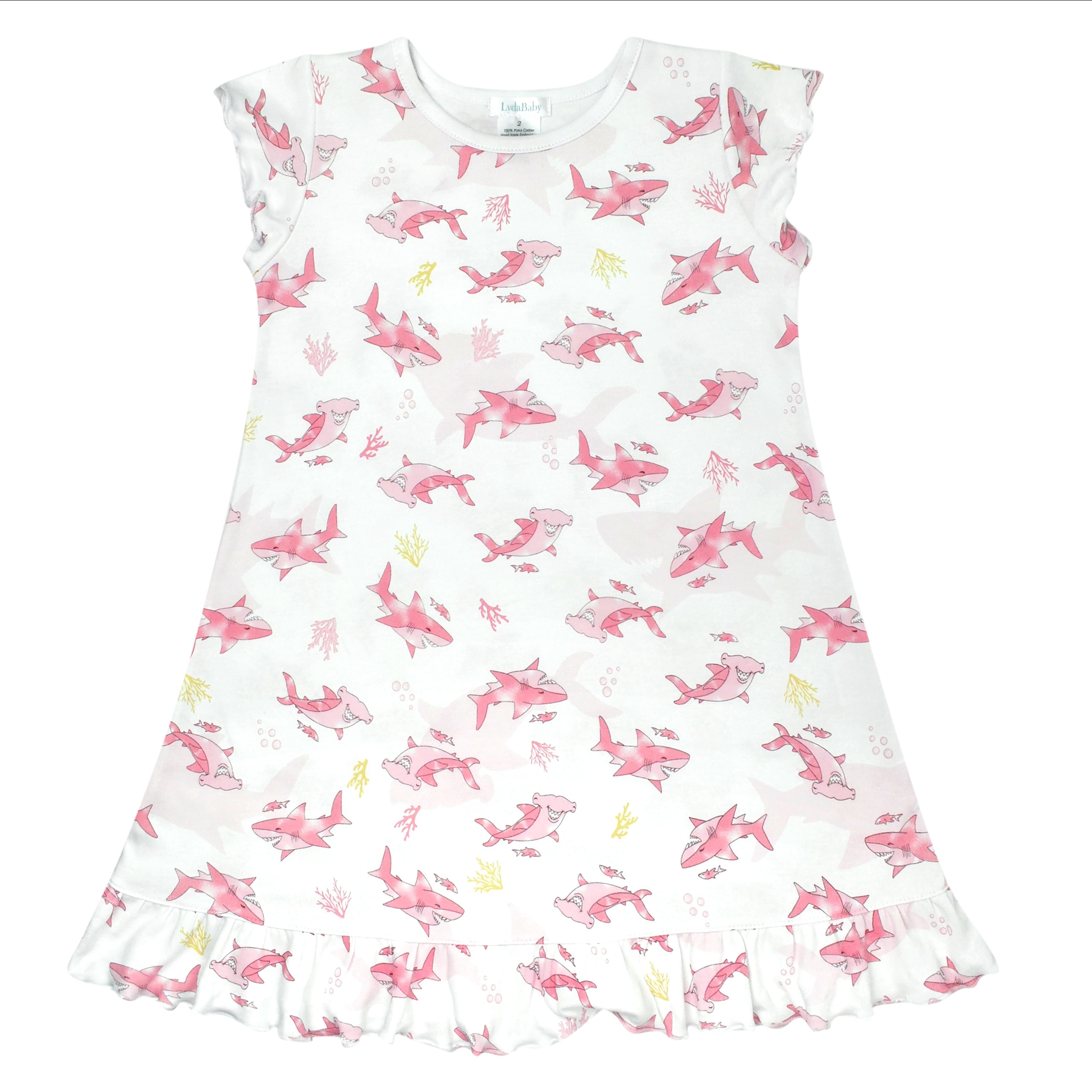 Soft baby pajama dress made with organic Peruvian Pima cotton, featuring playful friendly sharks print — gentle and breathable for sensitive skin.
