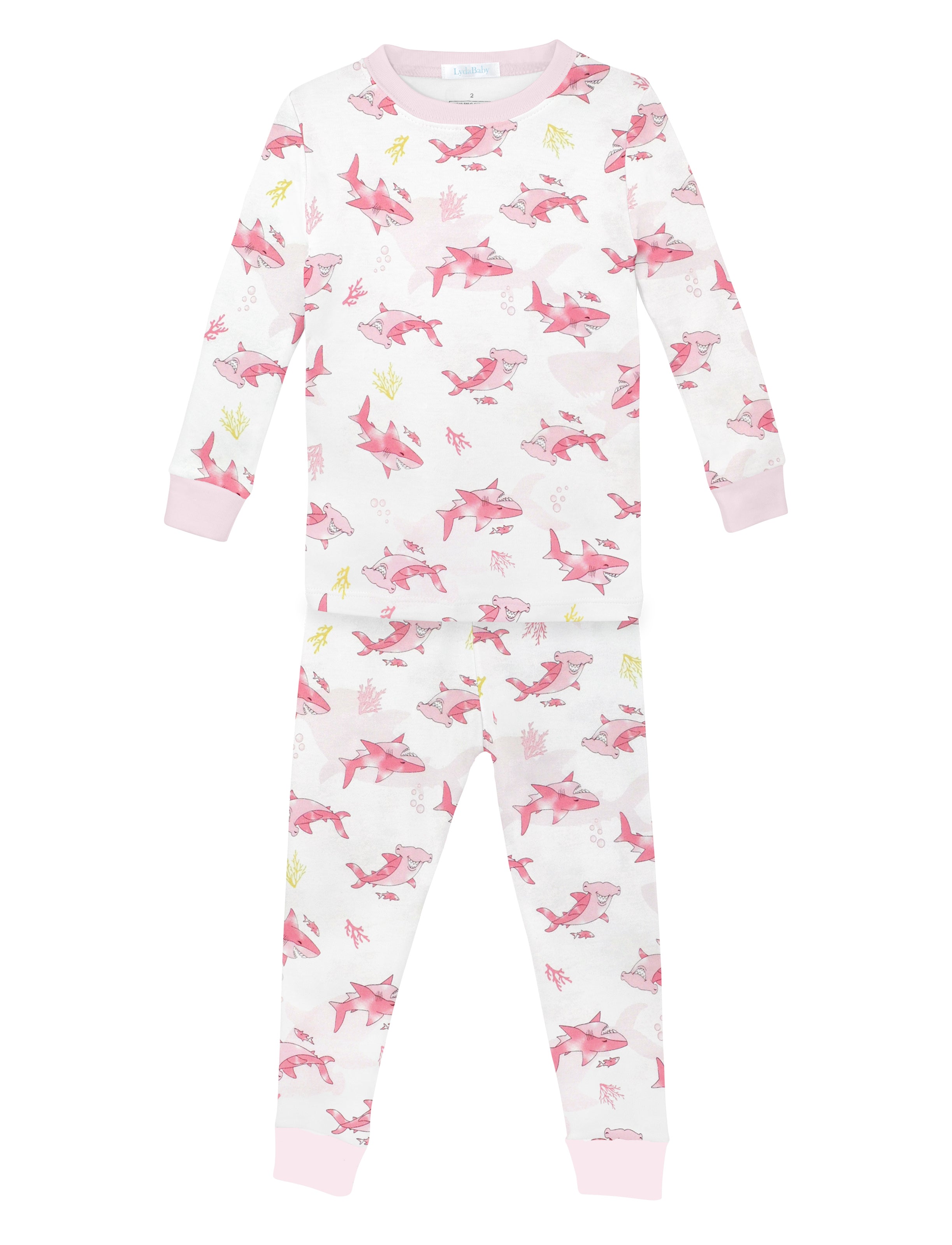 Soft baby girl pajama set in Peruvian Pima cotton with 'Friendly sharks' print — breathable and hypoallergenic luxury sleepwear from boutique baby clothing collections.