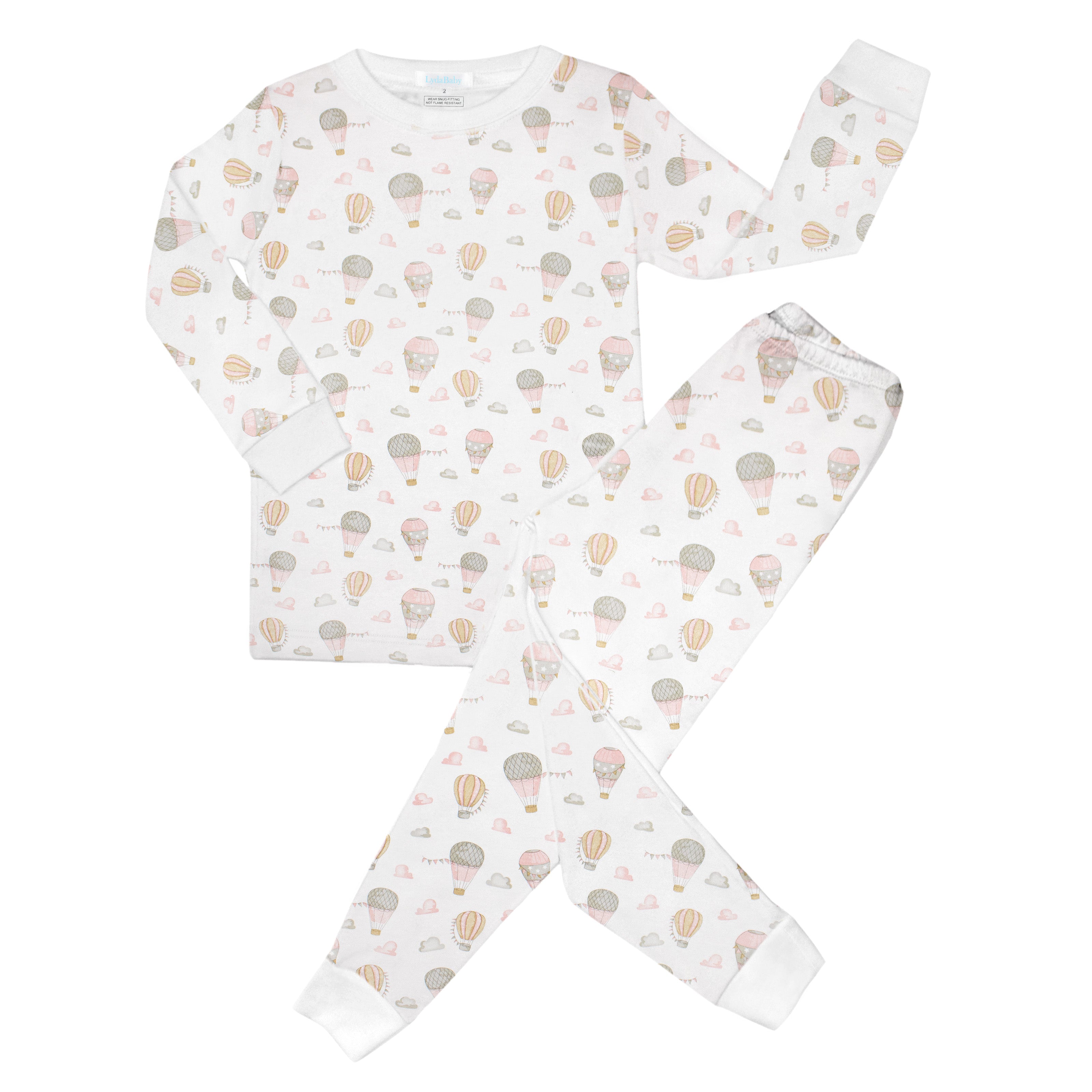Soft baby girl pajama set in Peruvian Pima cotton with 'Fly away' print — breathable and hypoallergenic luxury sleepwear from boutique baby clothing collections.
