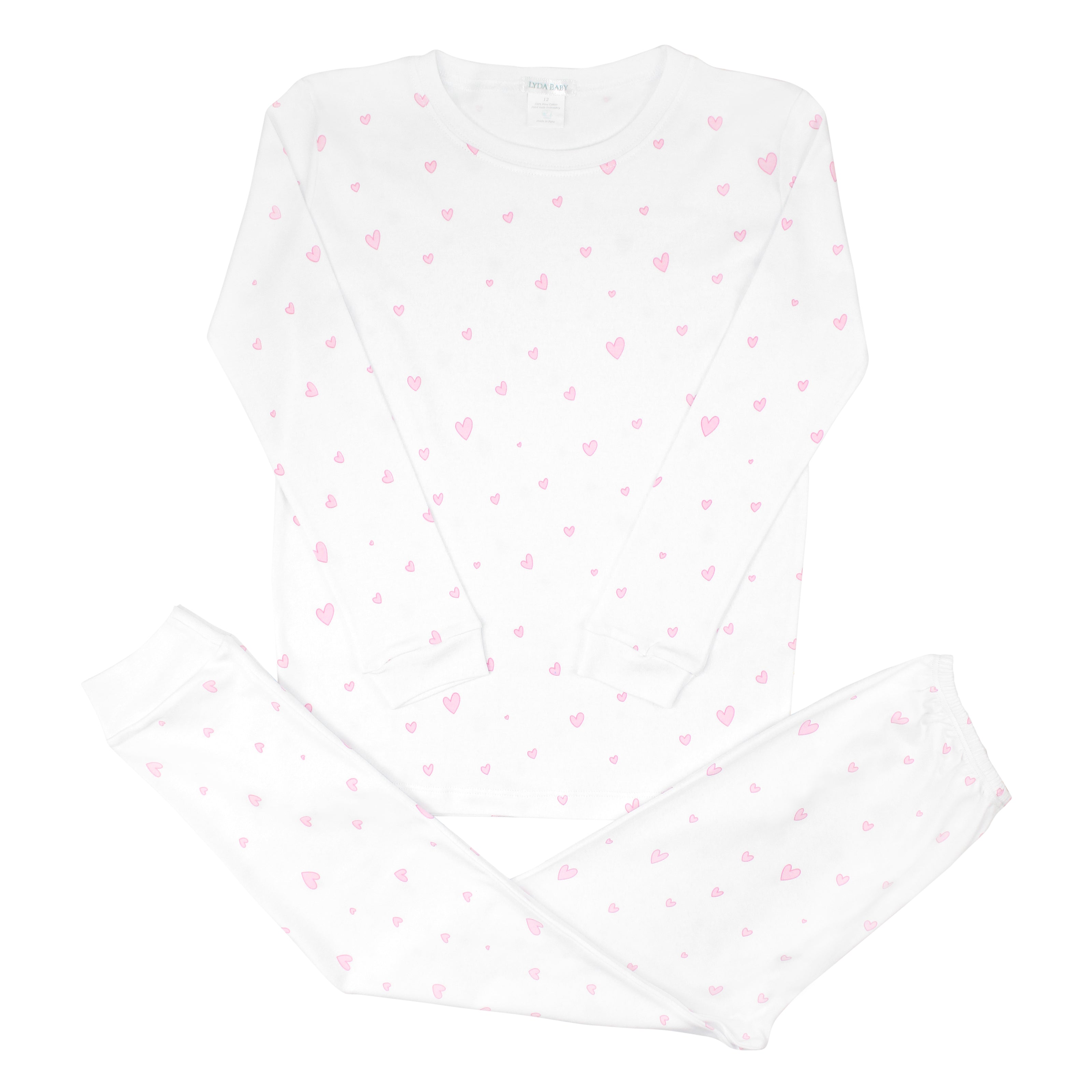 Soft baby girl pajama set in Peruvian Pima cotton with 'Unique hearts' print — breathable and hypoallergenic luxury sleepwear from boutique baby clothing collections.
