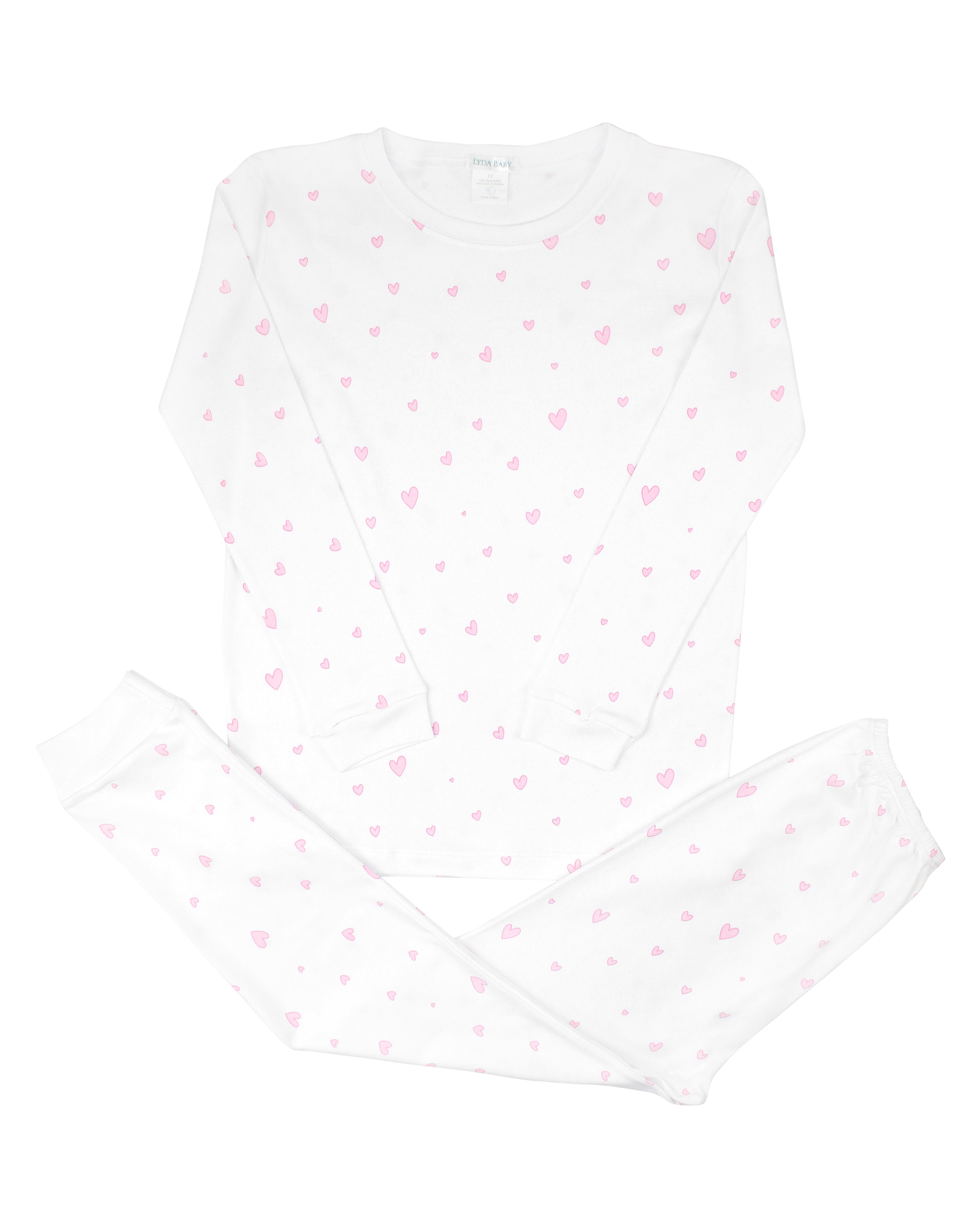 Soft baby girl pajama set in Peruvian Pima cotton with 'Unique hearts' print — breathable and hypoallergenic luxury sleepwear from boutique baby clothing collections.