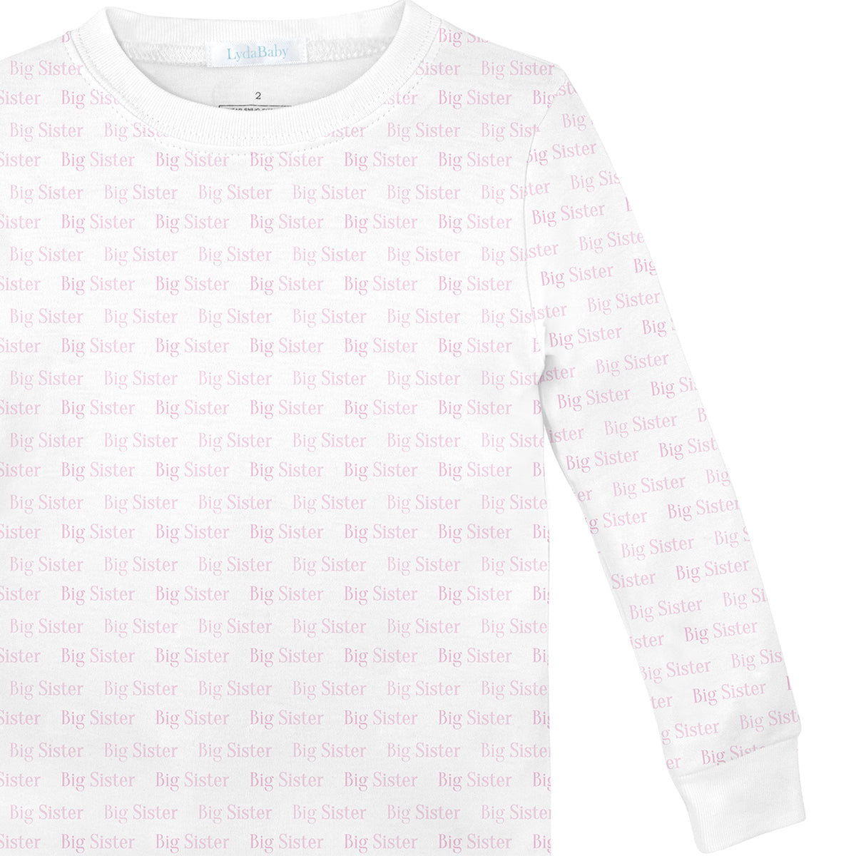 Soft baby girl pajama set in Peruvian Pima cotton with 'My big sister' print — breathable and hypoallergenic luxury sleepwear from boutique baby clothing collections.