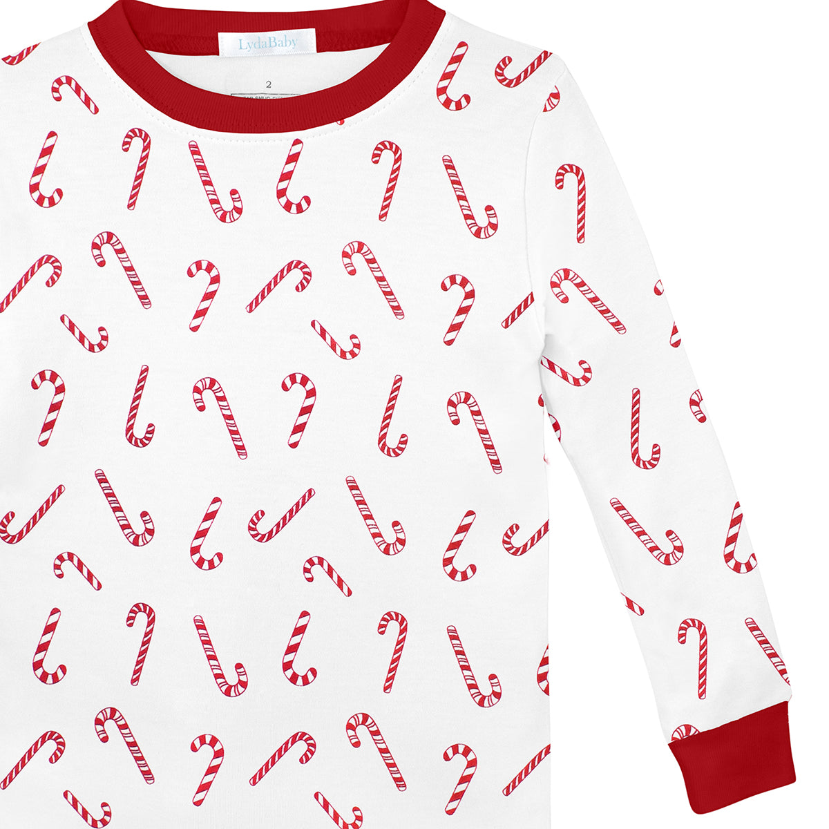 White unisex baby pajama set with long-sleeve top and pants, featuring red candy cane print.