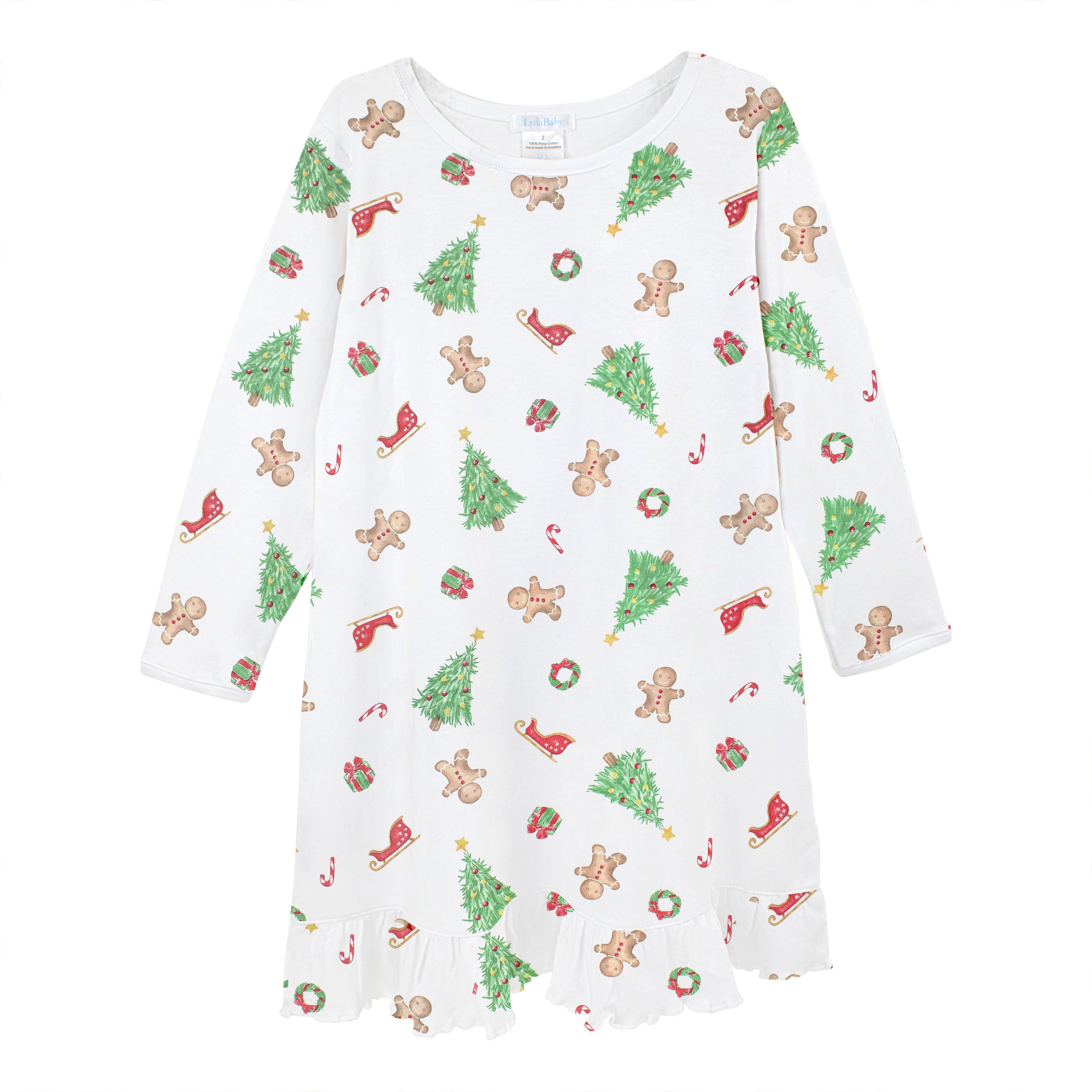 Luxury Christmas baby girl dress, long-sleeve, Peruvian Pima cotton with holiday print of trees, Santa’s sleigh, gingerbread cookies, and gifts.