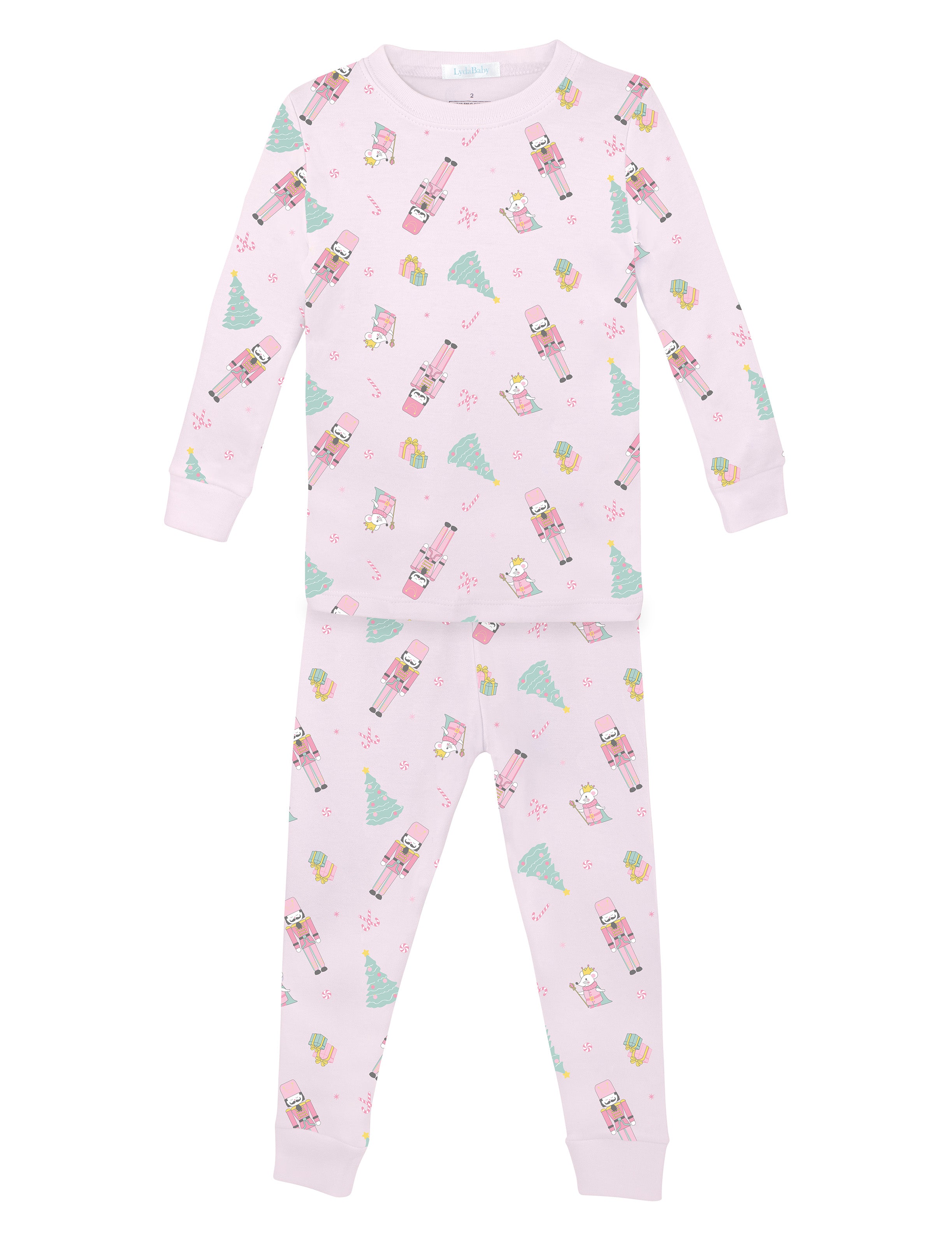 Pink two-piece girls’ pajama set in Peruvian Pima cotton with festive nutcracker and Christmas tree print.