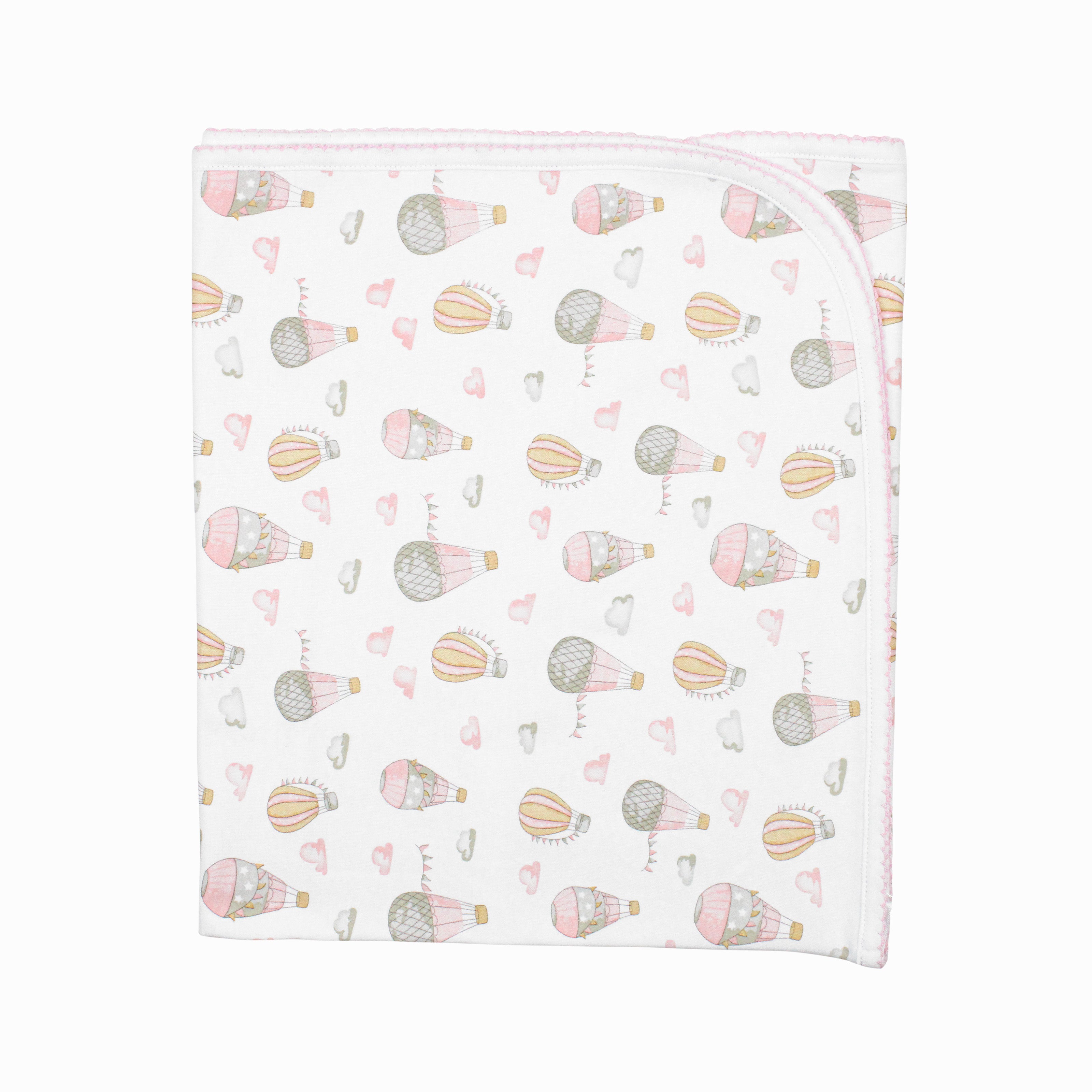  Light and breathable baby girl blanket in Peruvian Pima cotton with whimsical flying motifs — ideal for sensitive skin and cozy naps.
