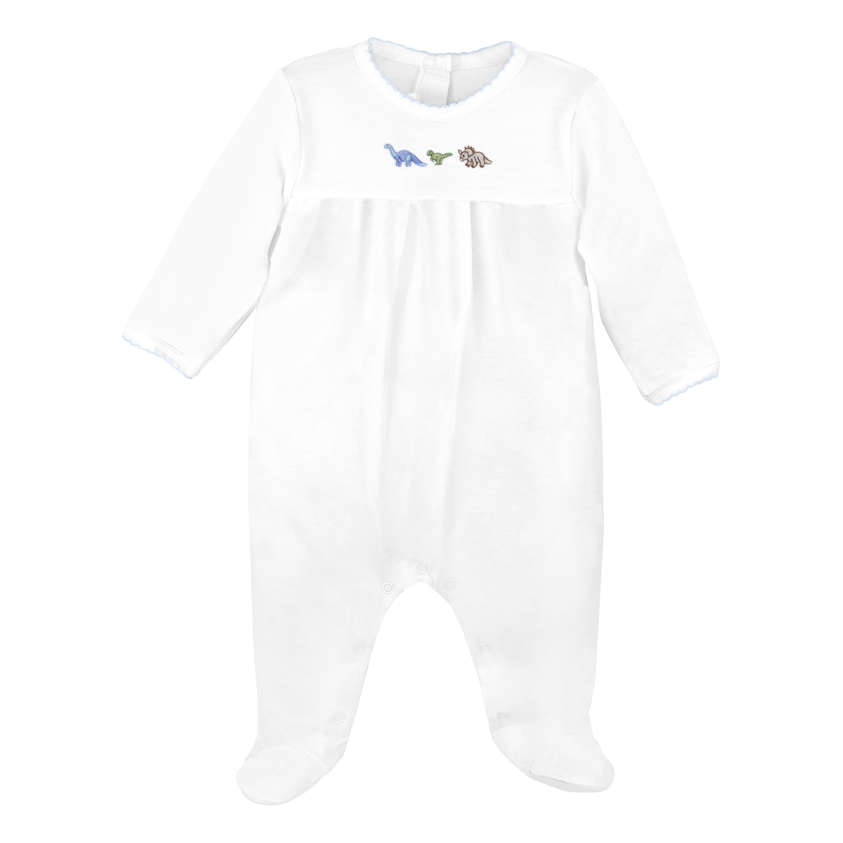 Baby boy footie in Peruvian Pima cotton with hand-embroidered dinosaurs and chest ruffle detail — cozy and gentle for sensitive skin.