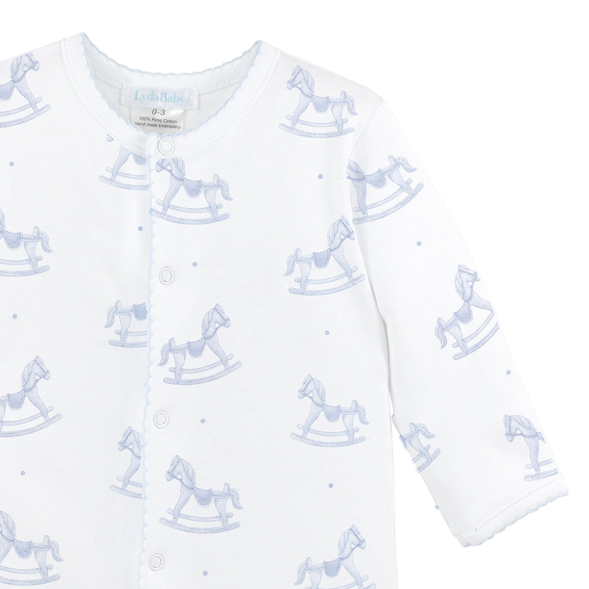 Luxury baby boy footie in Peruvian Pima cotton with wooden rocking horse print, soft and breathable infant outfit.