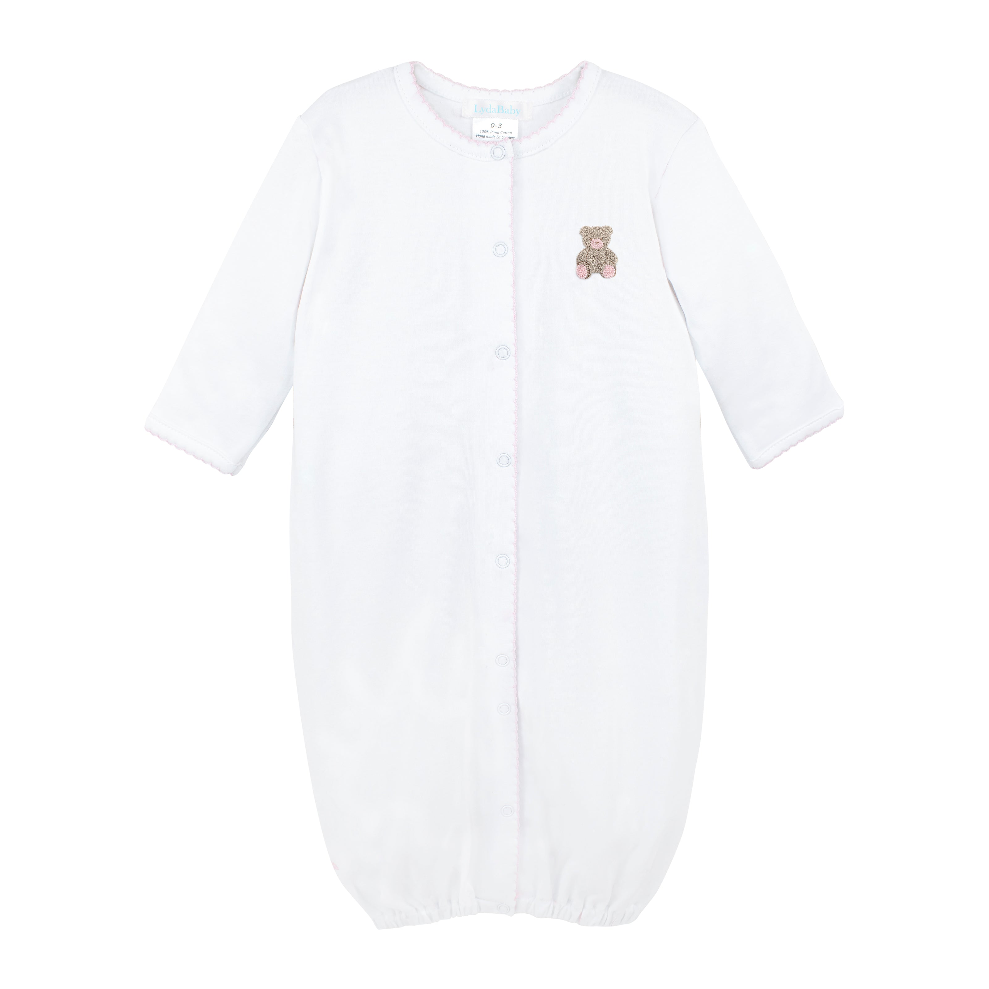  Charming baby girl converter hand-embroidered with baby toys design by expert Peruvian artisans on soft, breathable Peruvian Pima cotton — gentle and comfy for baby skin.