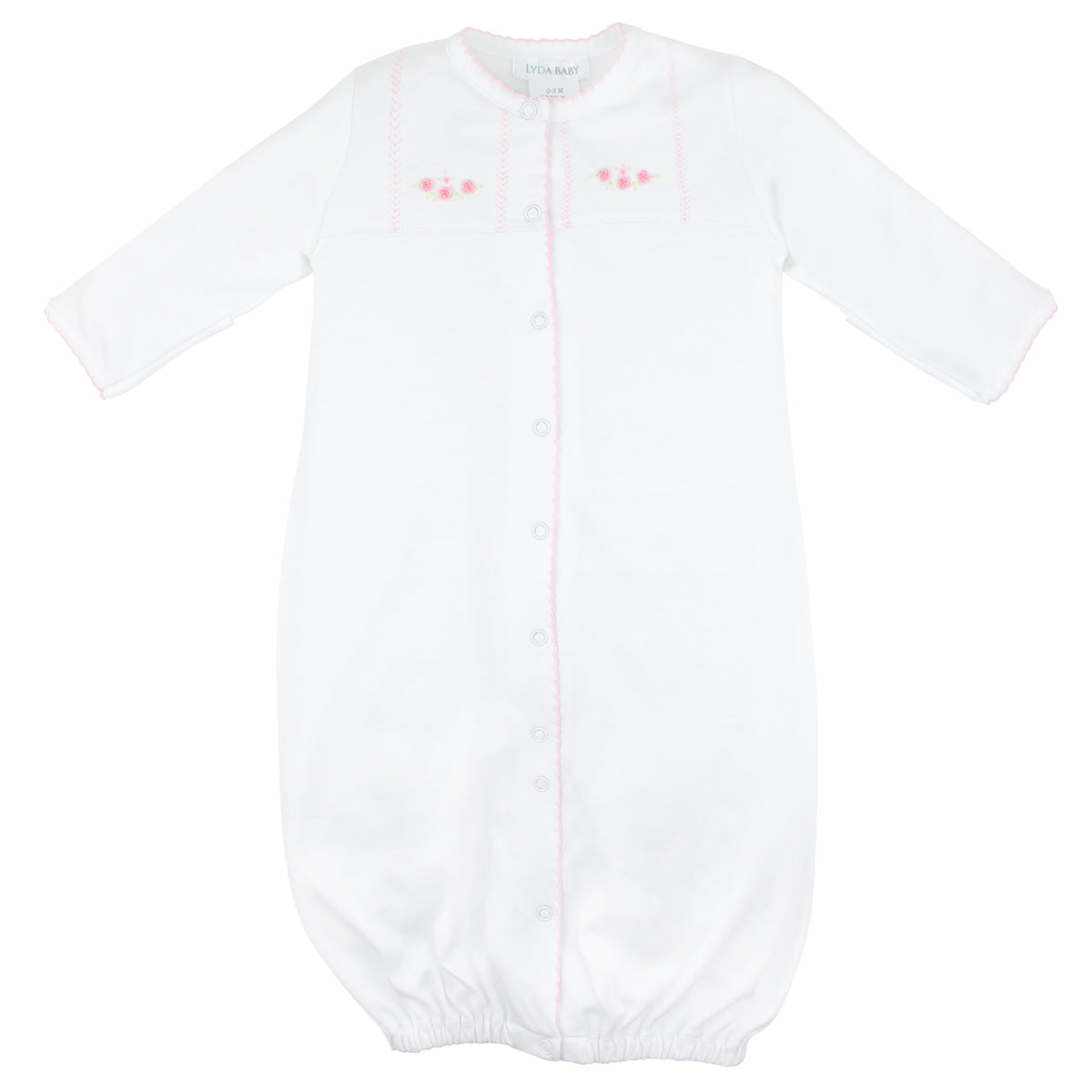  Sweet baby girl converter hand-embroidered with sweet dreams design by Peruvian artisans on soft, breathable Peruvian Pima cotton — cozy and gentle on baby skin.
