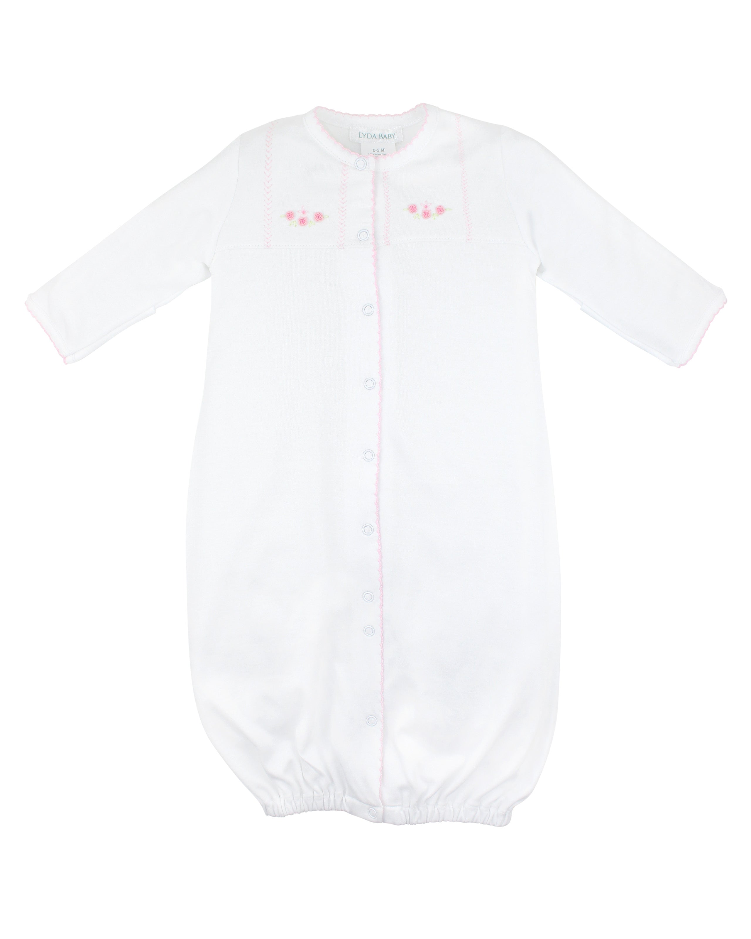  Sweet baby girl converter hand-embroidered with sweet dreams design by Peruvian artisans on soft, breathable Peruvian Pima cotton — cozy and gentle on baby skin.