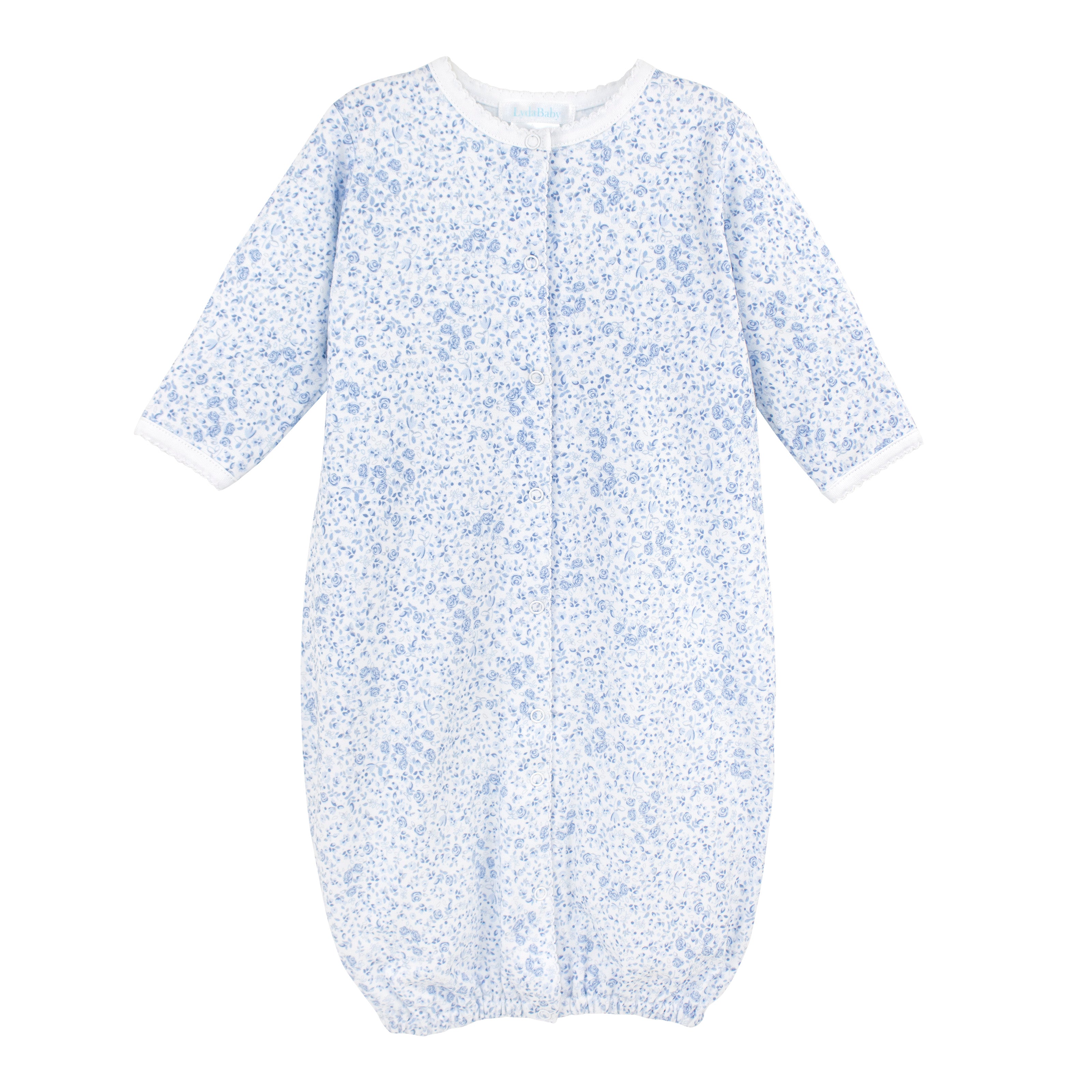 Beautiful baby girl converter with blue roses print on premium Peruvian Pima cotton — soft, breathable, and perfect for delicate skin.
