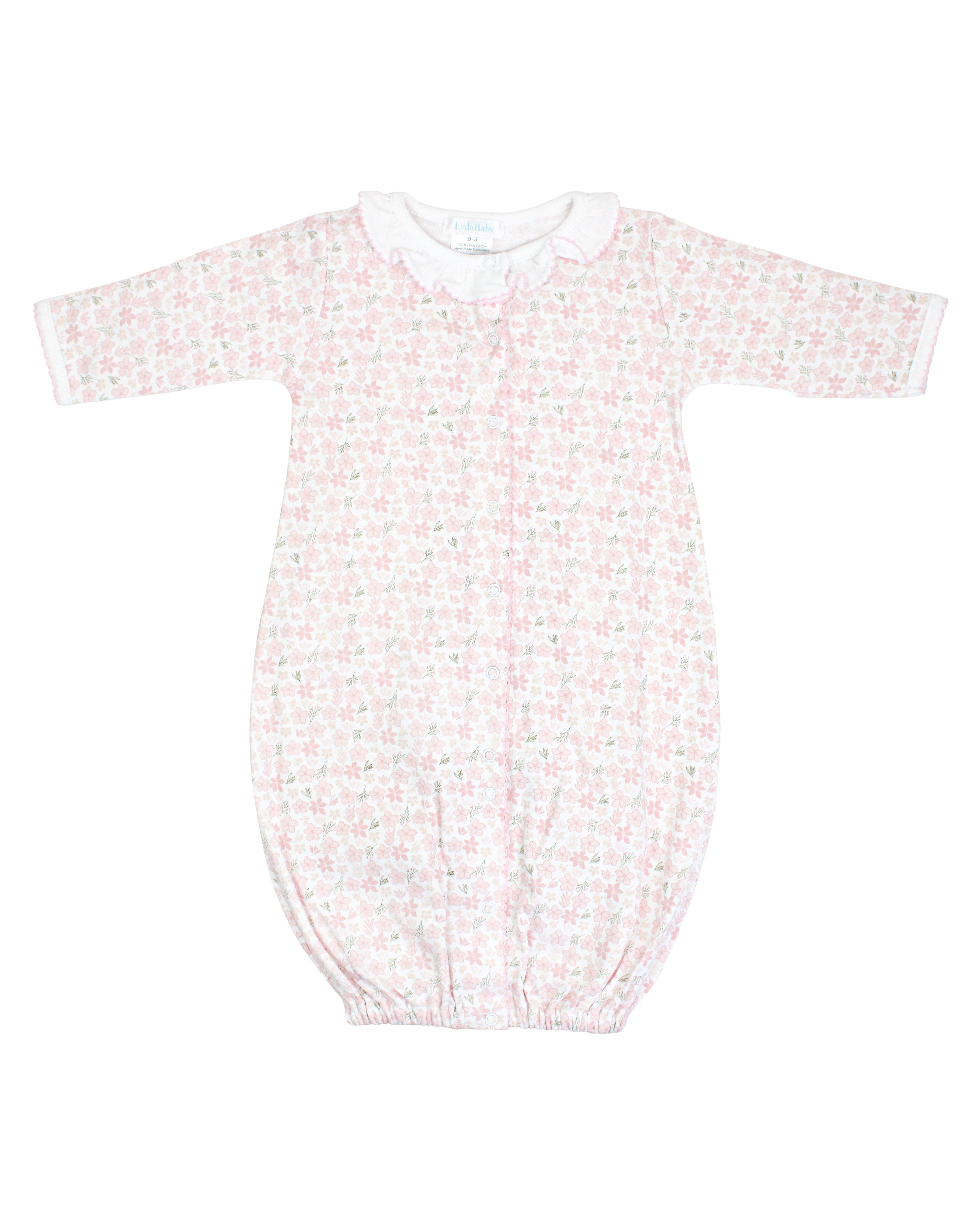  Delicate baby girl converter with winter blooming flowers printed on soft, breathable Peruvian Pima cotton — cozy and skin-friendly.