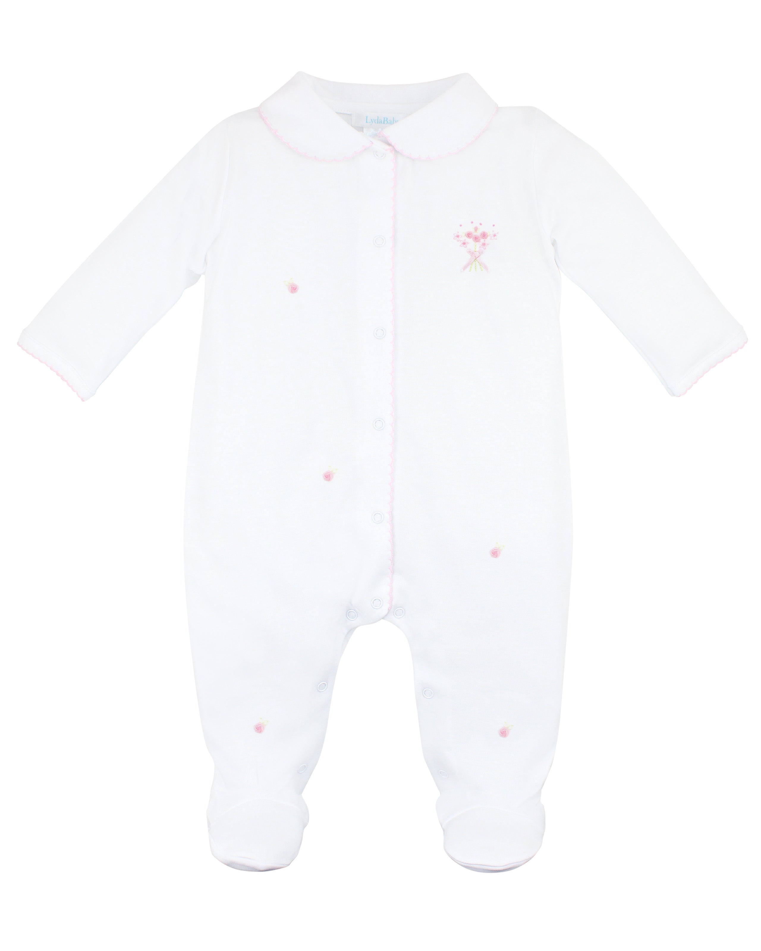White baby girl footie with pink crochet on Peter Pan collar and snaps, floral bouquet embroidery on chest, and scattered tiny flowers.
