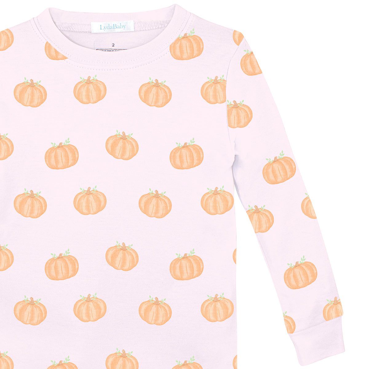 Luxury baby girl two-piece pajama set in pink Peruvian Pima cotton with adorable orange pumpkin print, soft and perfect for cozy nights.