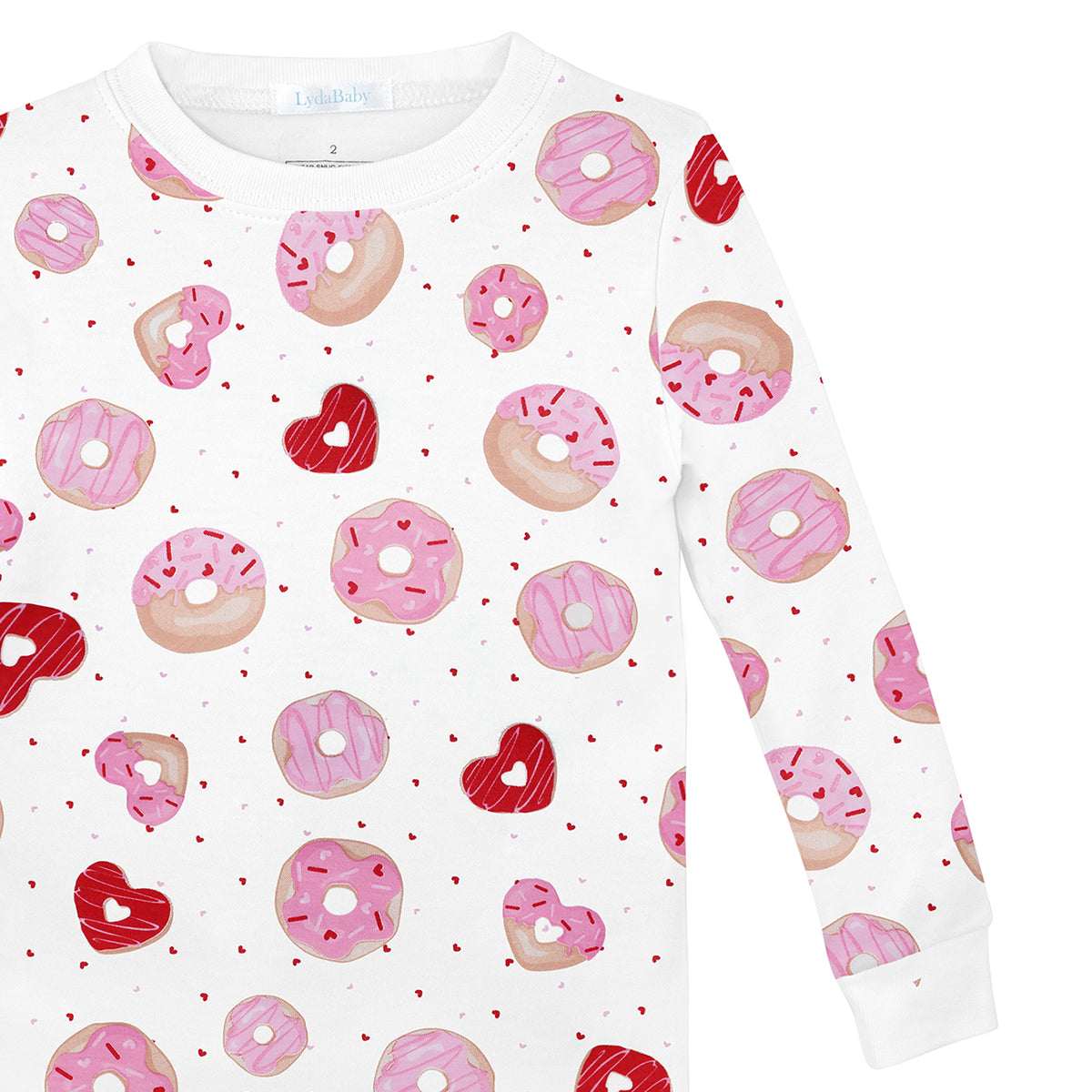 Luxury baby girl pajamas – two-piece Peruvian Pima cotton set with red and pink donut prints, breathable and hypoallergenic baby sleepwear.