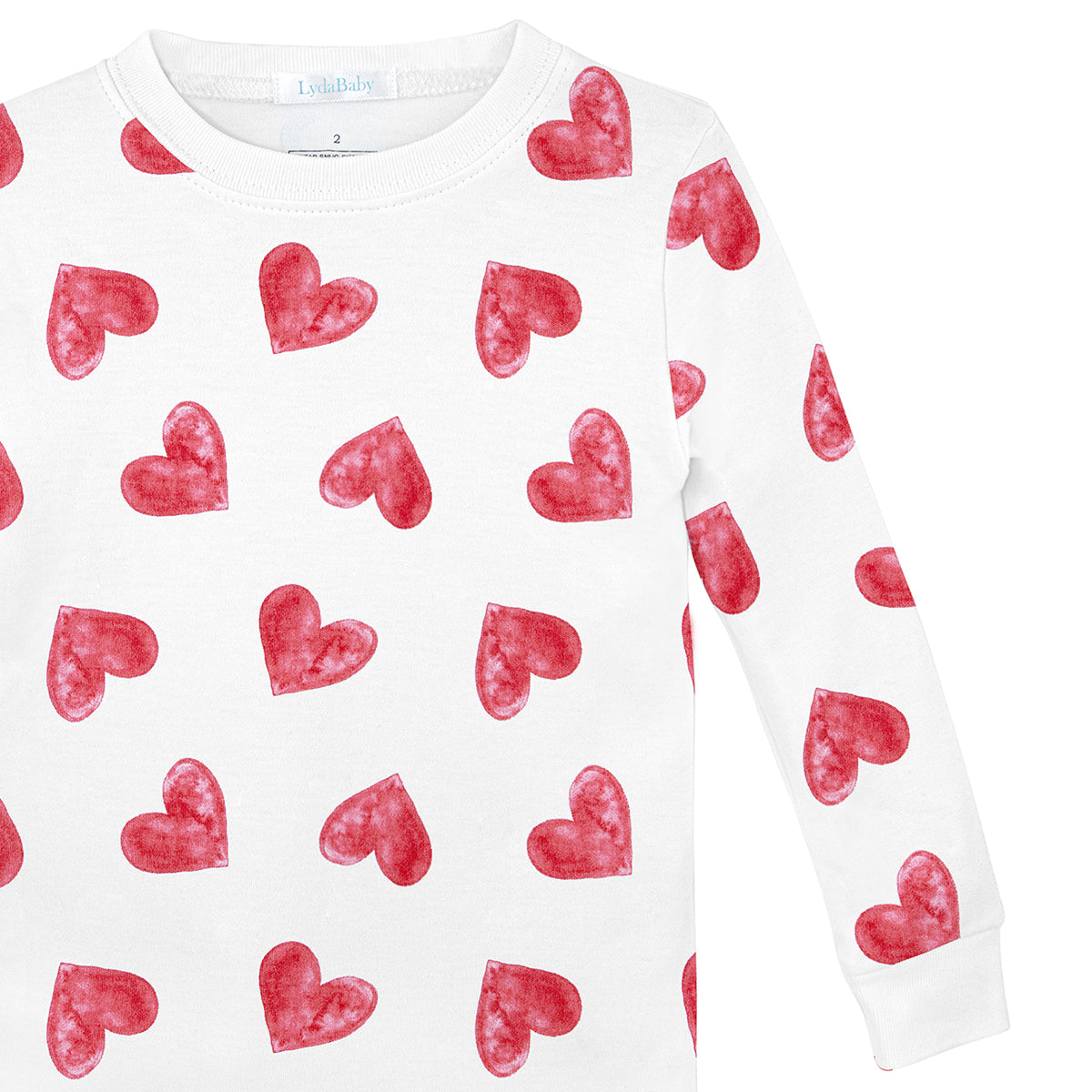 Luxury baby girl clothes – two-piece Peruvian Pima cotton pajamas with oversized pink heart prints, breathable and hypoallergenic baby sleepwear.