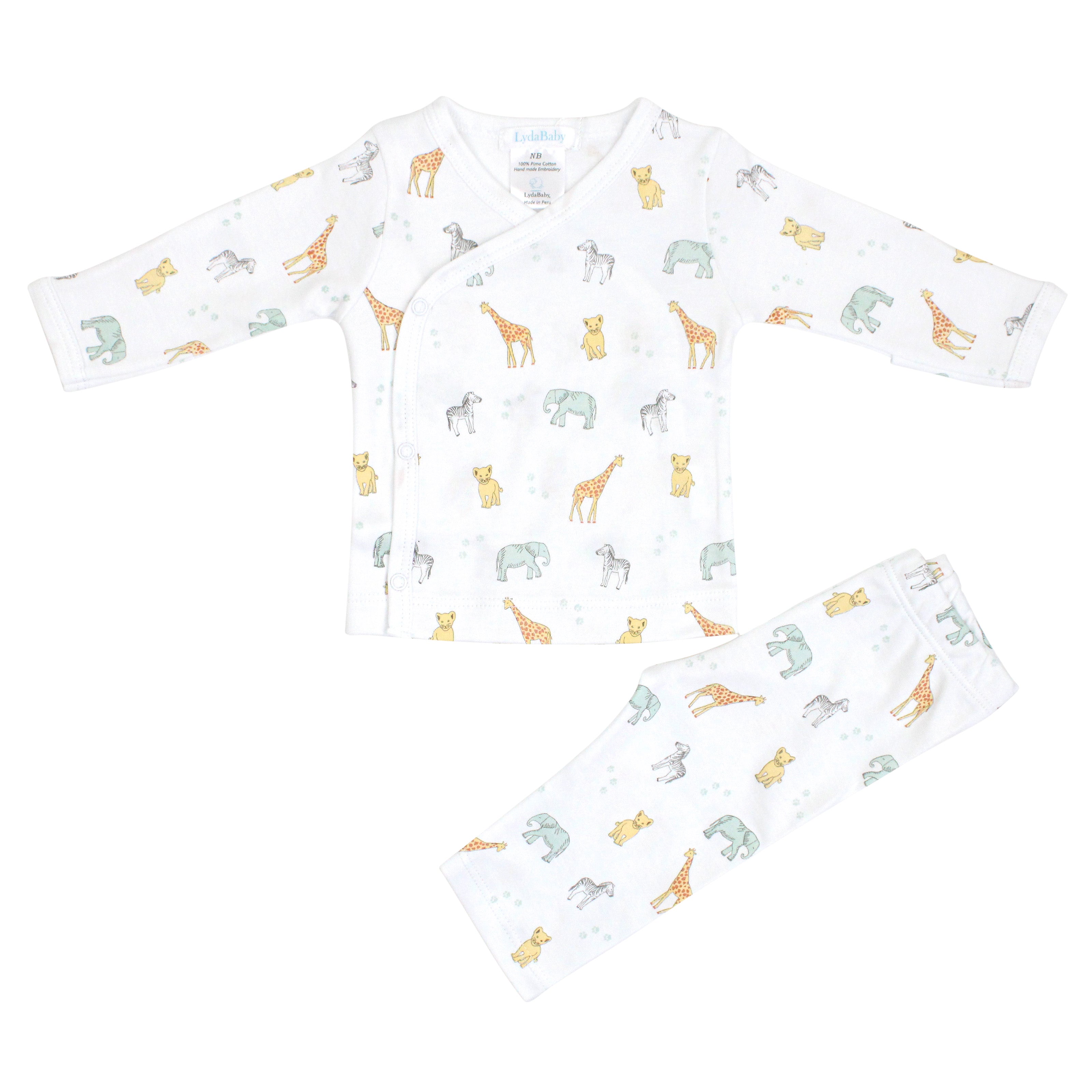 Baby boy two-piece pajama set in soft Peruvian Pima cotton with crossover top and pants, printed with cute safari animals — cozy and full of adventure.