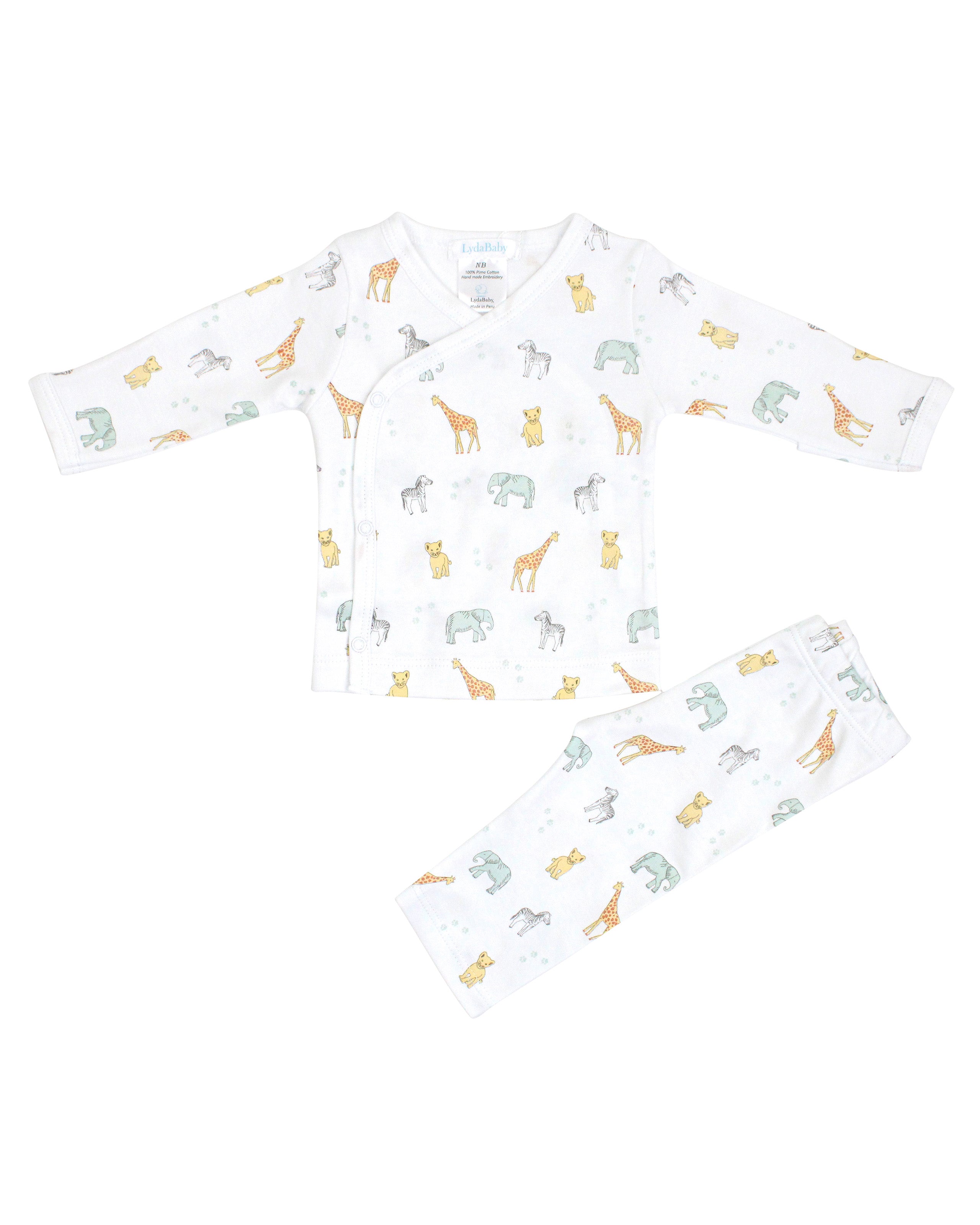 Baby boy two-piece pajama set in soft Peruvian Pima cotton with crossover top and pants, printed with cute safari animals — cozy and full of adventure.