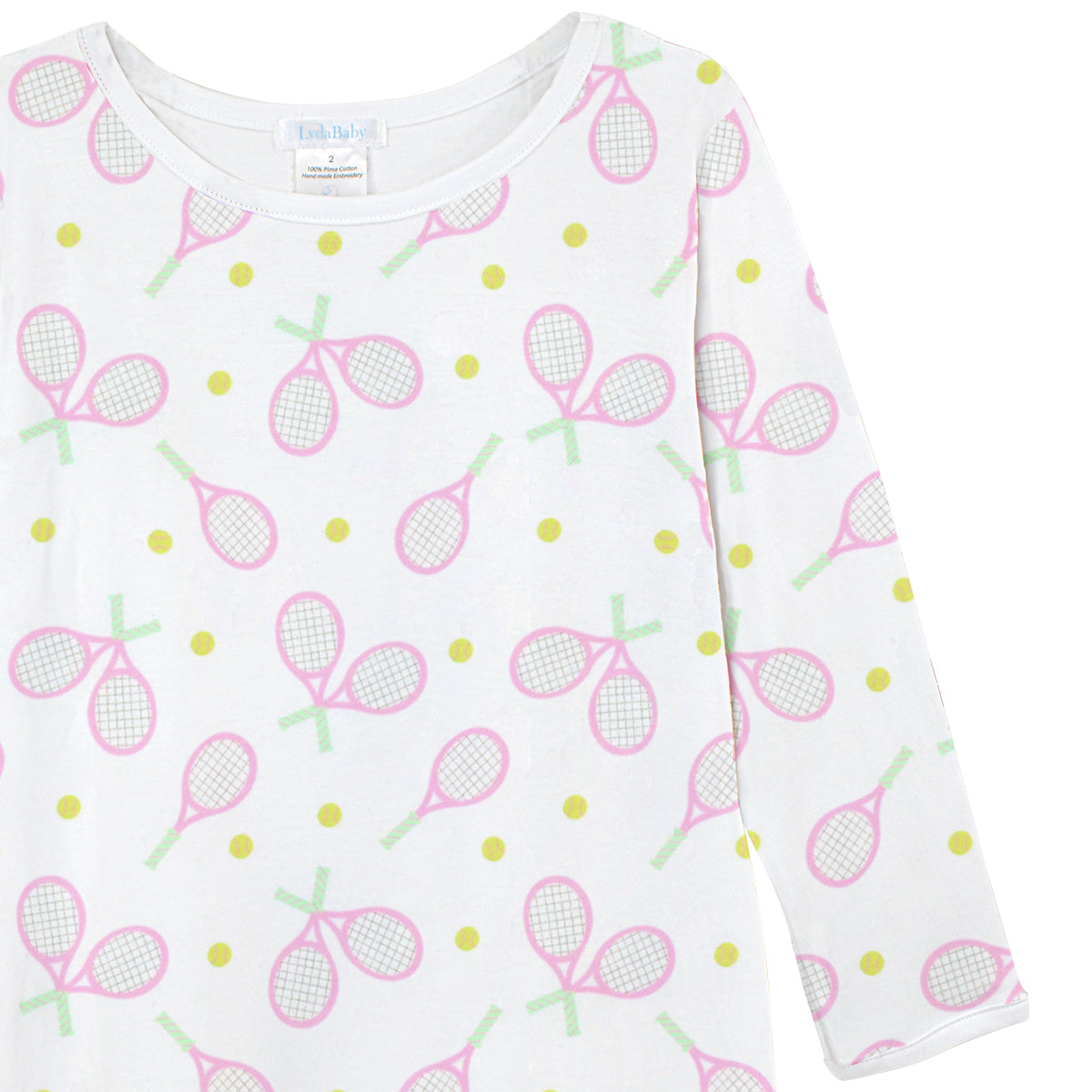 Luxury baby girl dress made from premium Peruvian Pima cotton with a fun printed tennis-inspired “Game Set Match” design. A breathable and elegant choice for boutique baby clothes lovers.