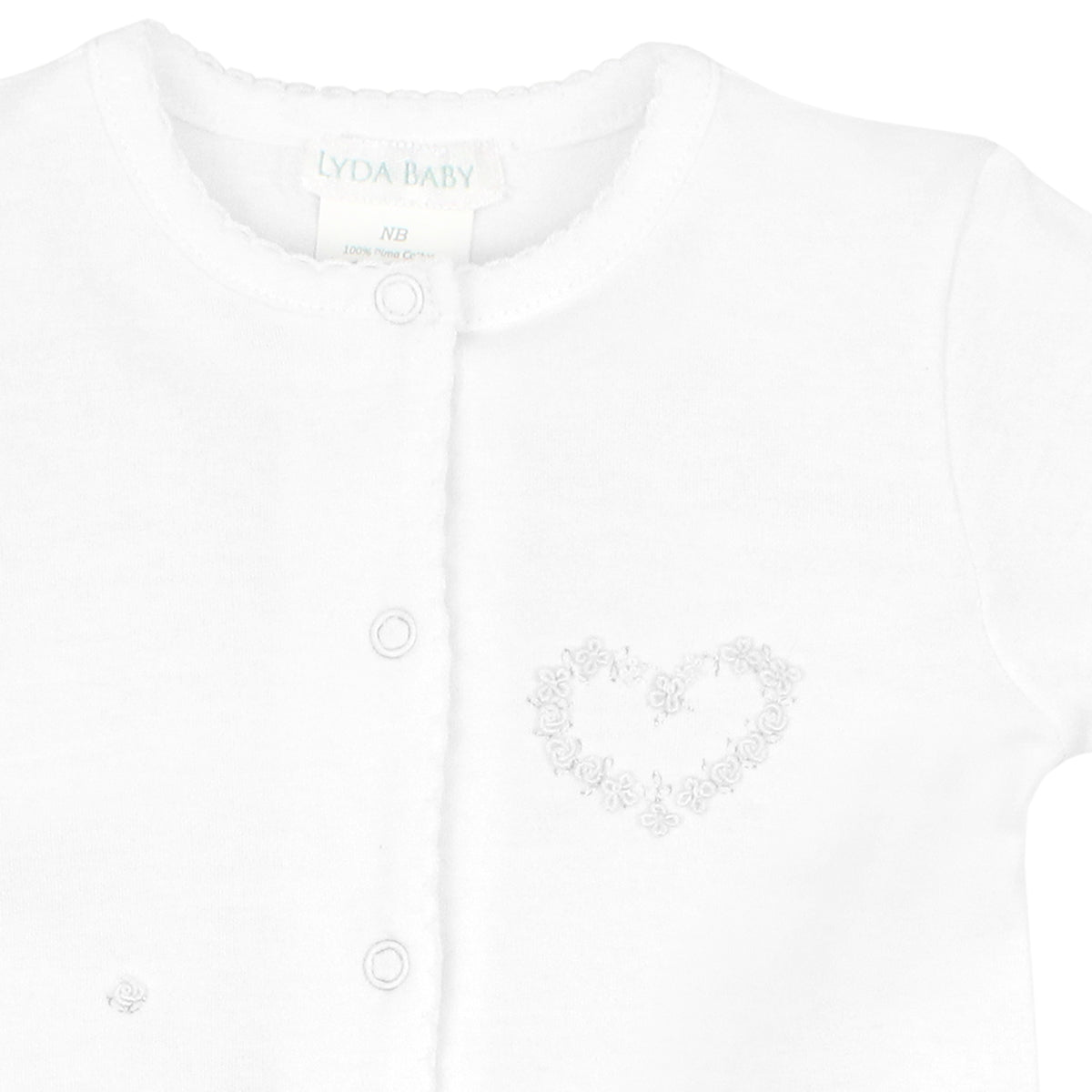Luxury white footie for baby girl in Peruvian Pima cotton with hand-embroidered heart of white flowers