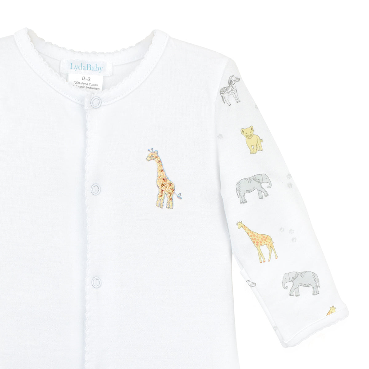 Unisex baby footie made from ultra-soft Peruvian Pima cotton, featuring safari animals print on sleeves and feet, and hand-embroidered wildlife scene on the chest — breathable, hypoallergenic, and full of adventurous charm.
