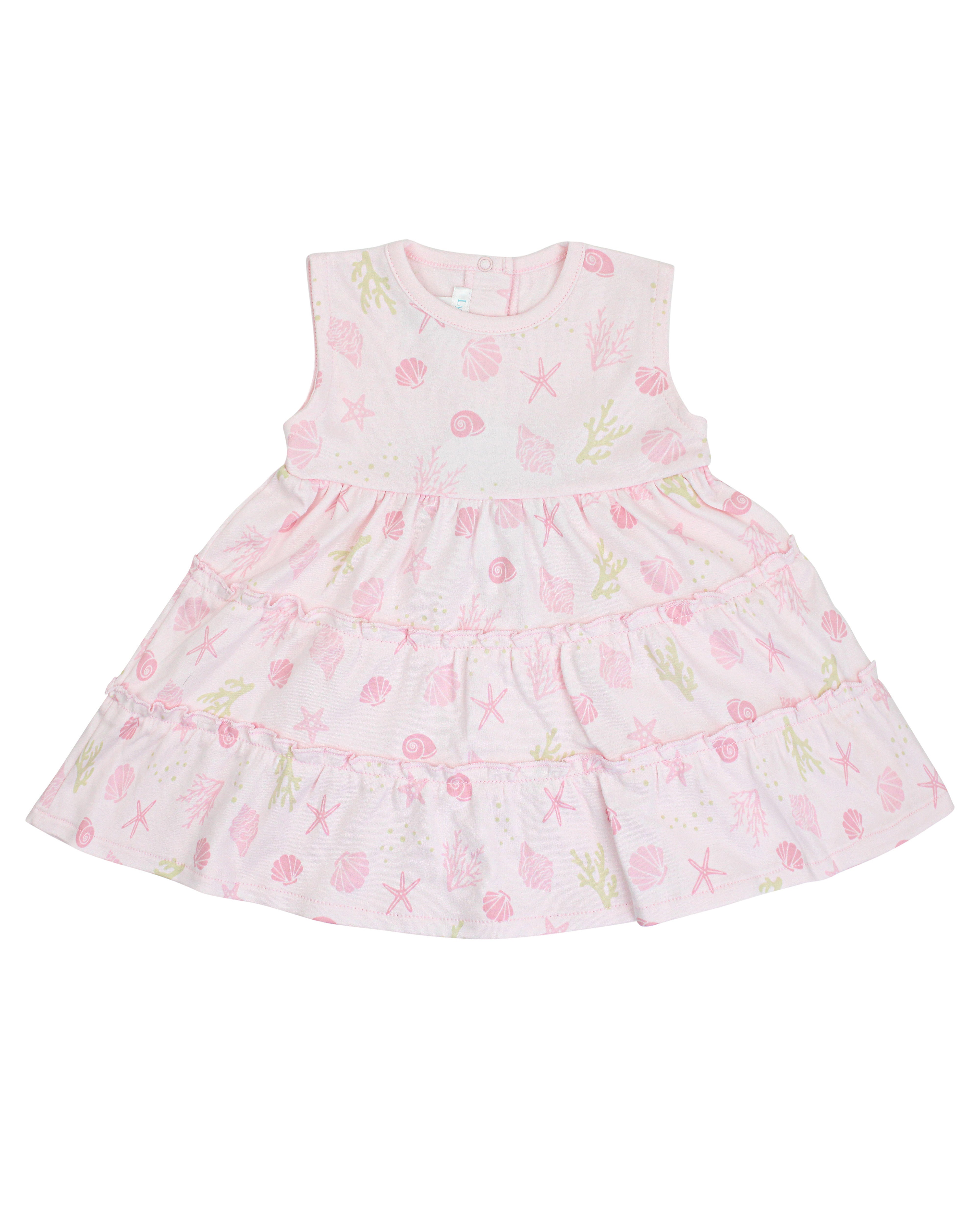 Sleeveless baby girl dress in Peruvian Pima cotton with seashells print and double ruffle skirt — light, breathable, and ideal for sunny days.