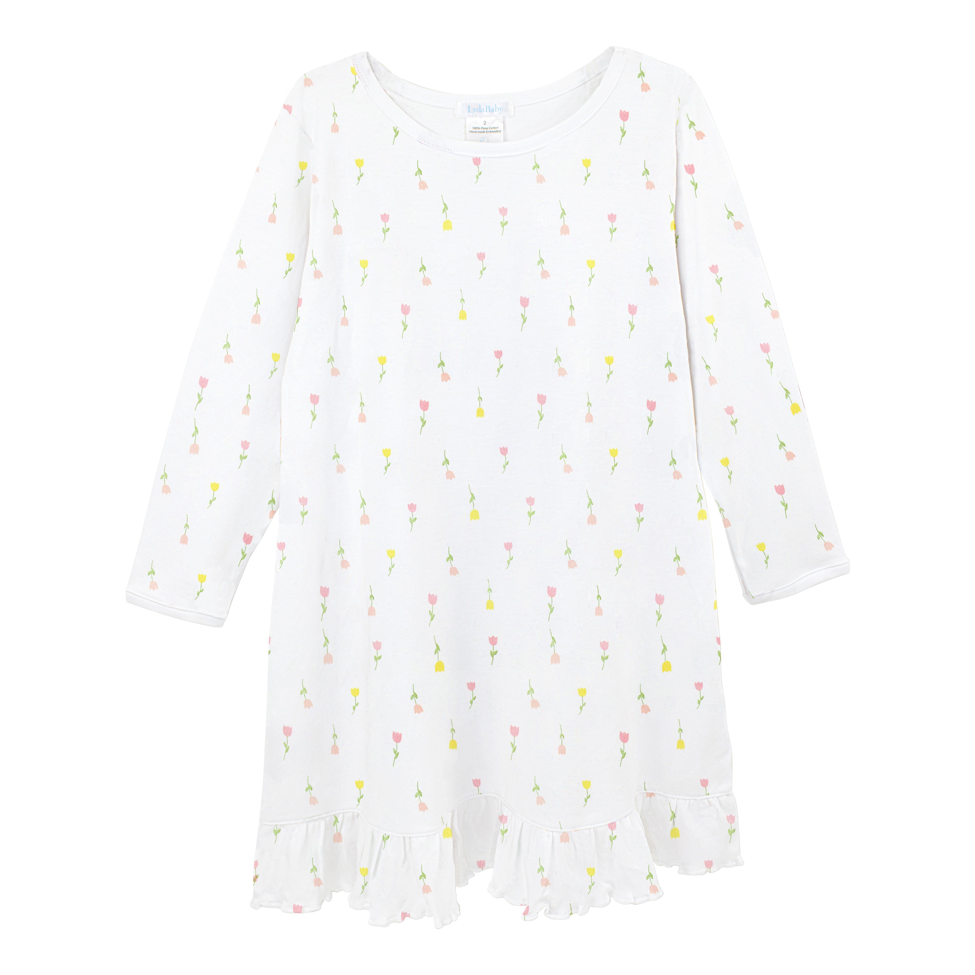 Baby girl pajama dress in sustainable Peruvian Pima cotton with delicate tulip flowers print — gentle on baby’s skin and perfect for all-night comfort.