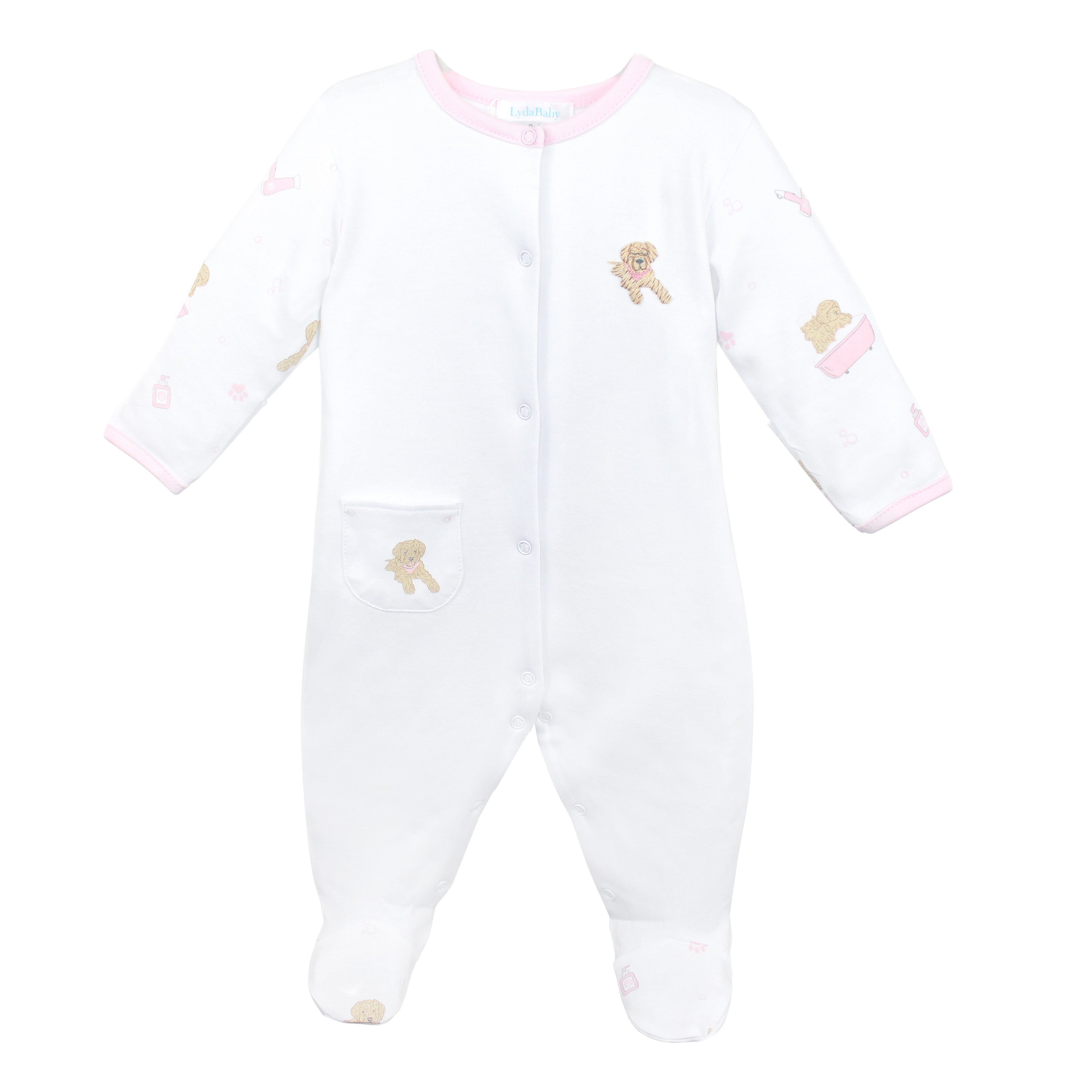 Charming baby girl footie designed in premium Peruvian Pima cotton, showcasing a delicate dog embroidery on the chest, soft pink neckline, and printed sleeves inspired by the Pet Spa theme for everyday comfort and style.