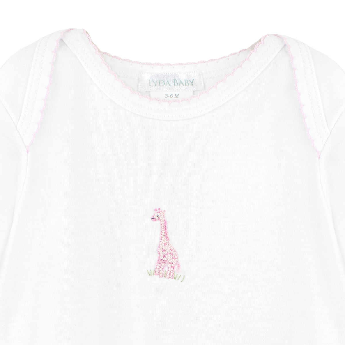 Peruvian Pima cotton baby girl gown with pink hand-embroidered safari animal — luxurious, breathable, and ideal for delicate newborn skin.
