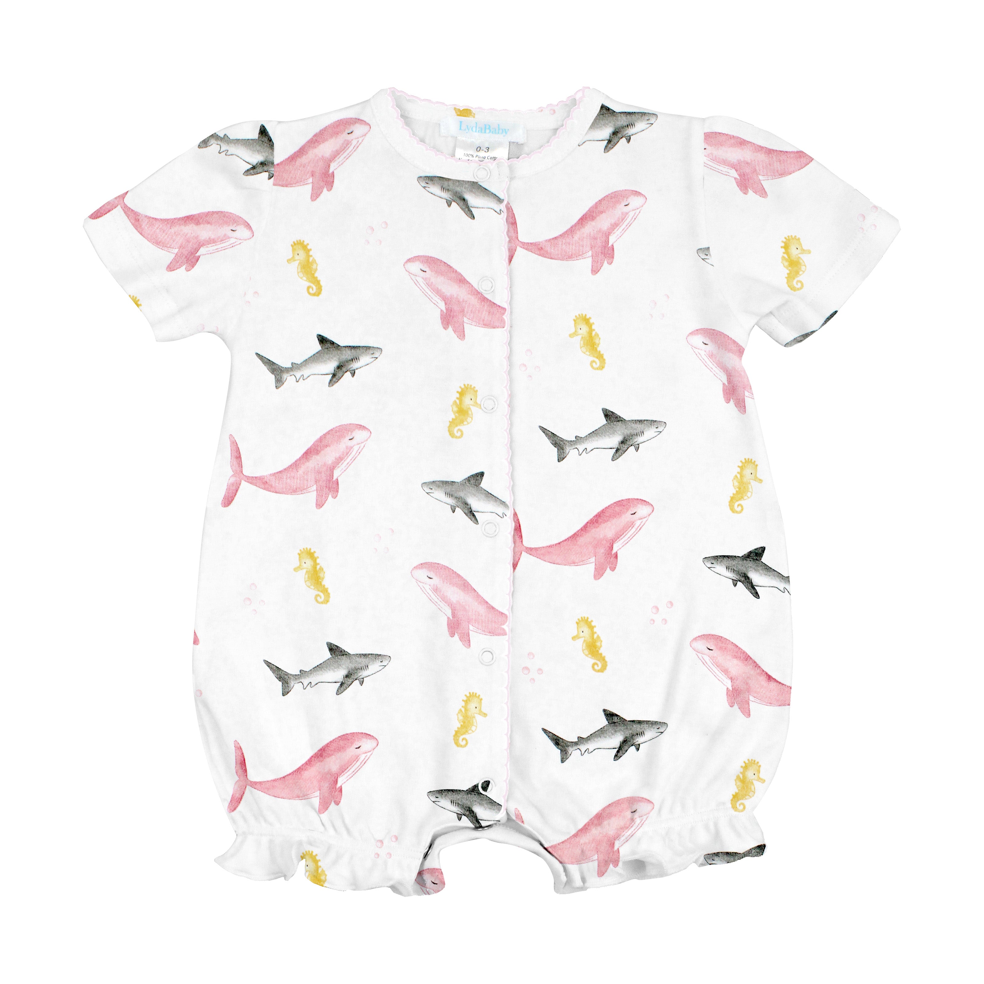 Baby girl romper with whale and shark print made from soft Peruvian Pima cotton.