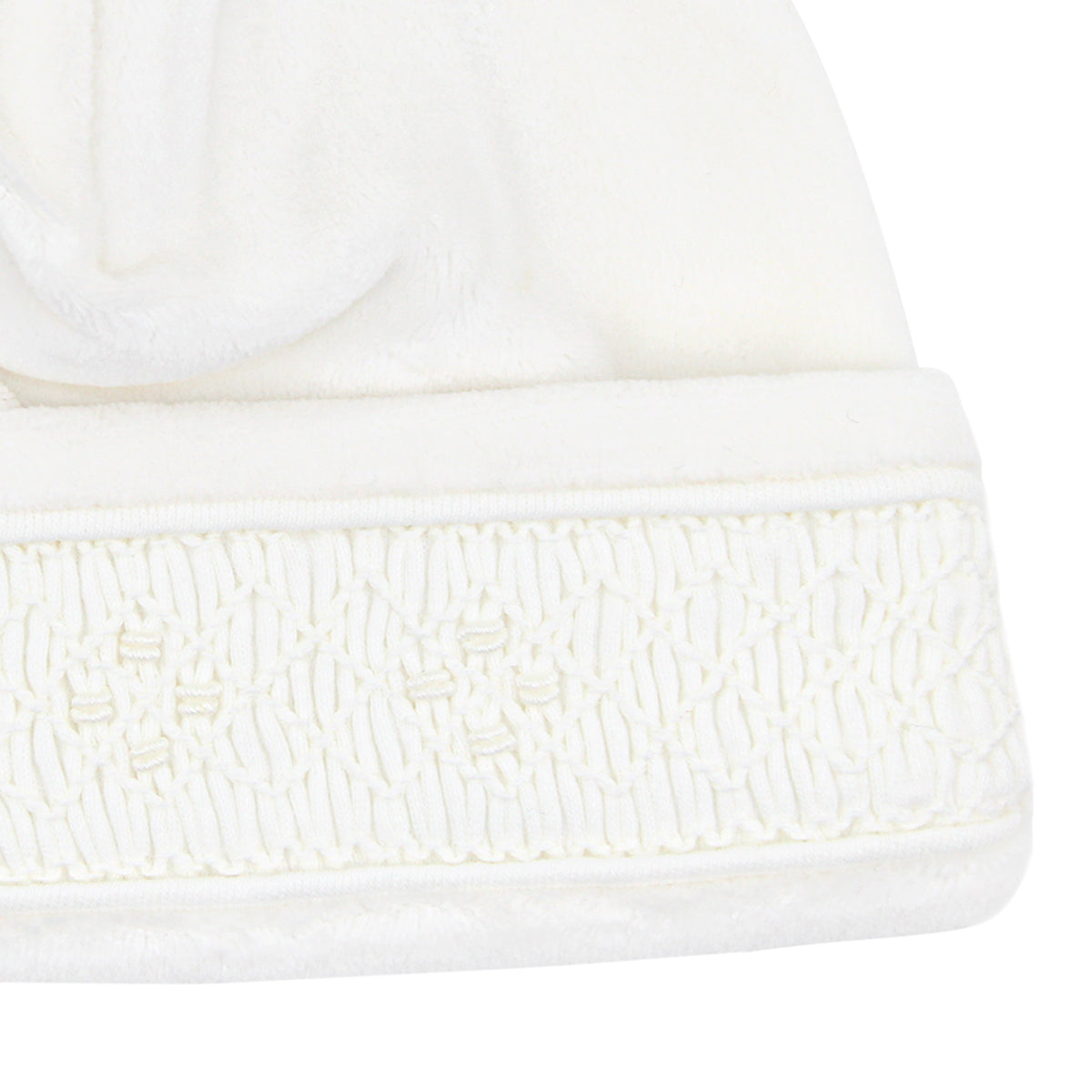 Unisex baby hat in velour with smocked edge and ivory seed embroidery